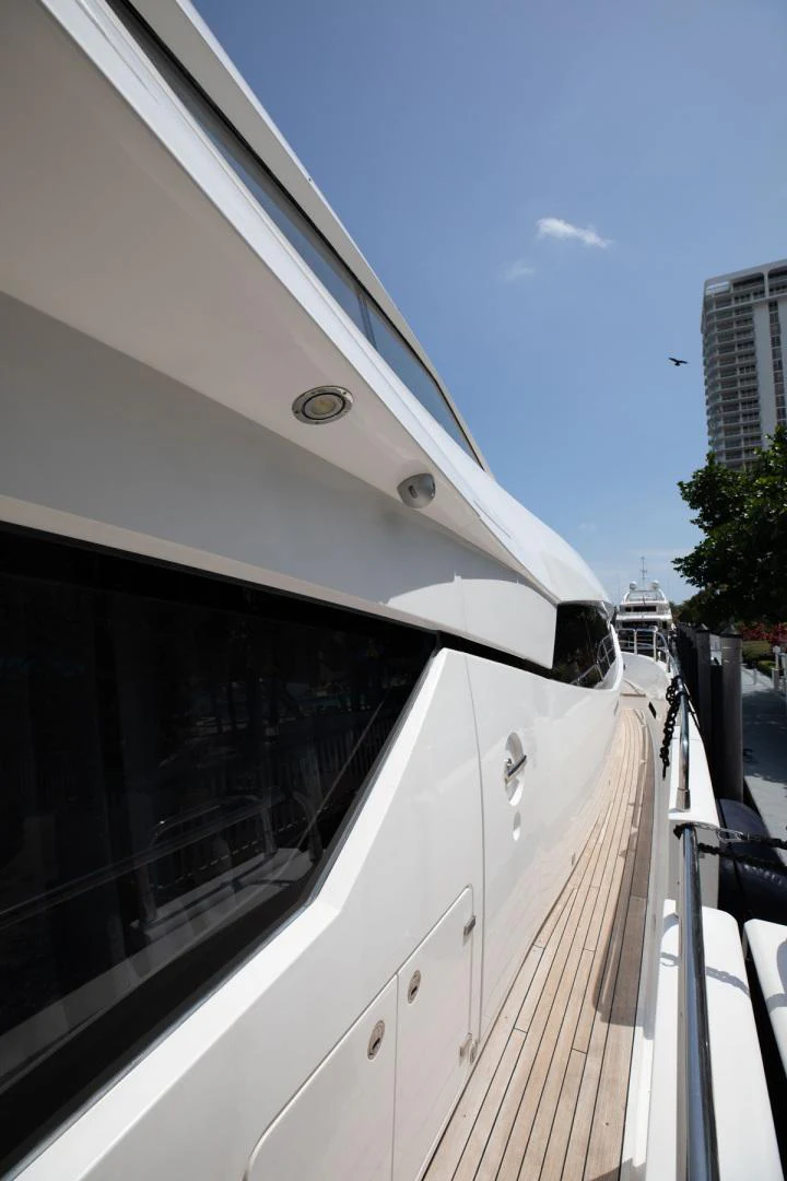 a white bus on the street aboard LE SORELLE III Yacht for Sale