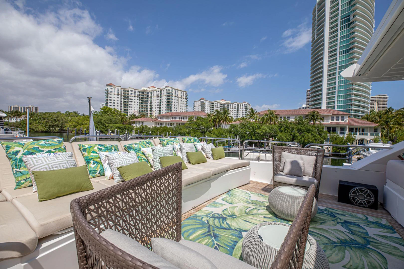 a patio with chairs and a pool aboard LE SORELLE III Yacht for Sale