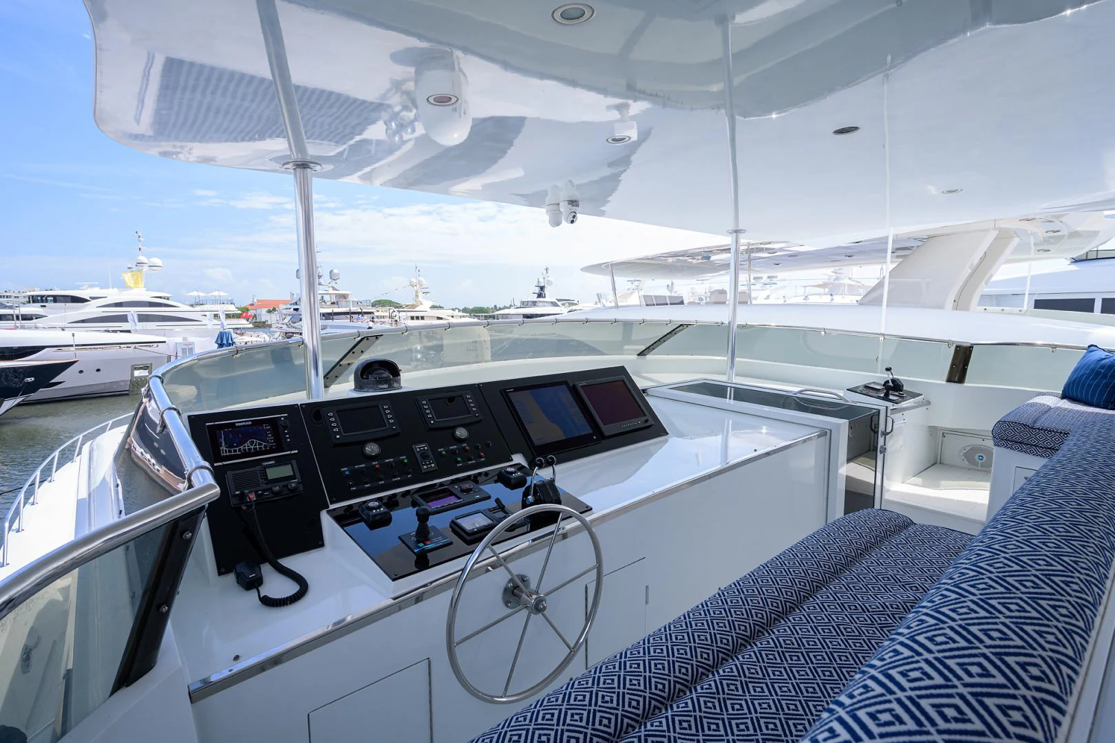 a boat with a table and chairs aboard MEMORYMAKER Yacht for Sale