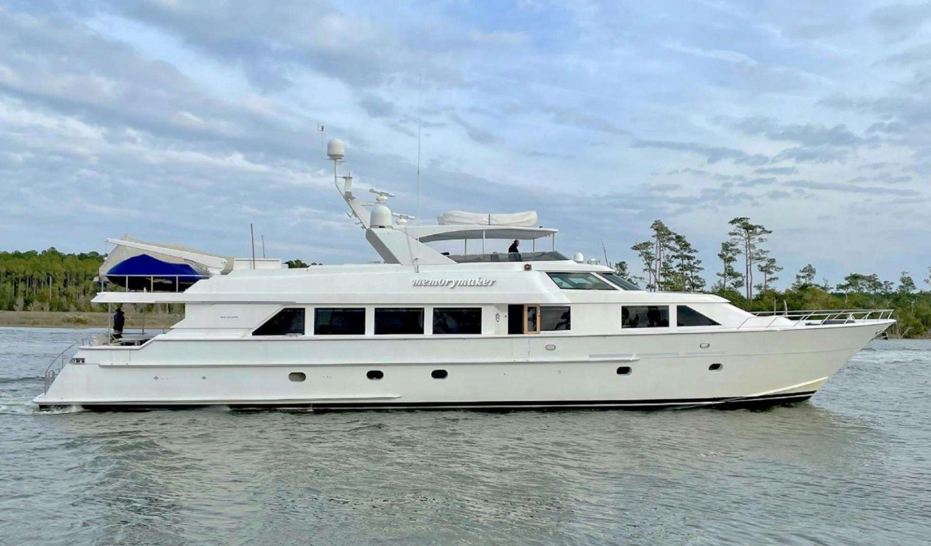 a white yacht on the water aboard MEMORYMAKER Yacht for Sale