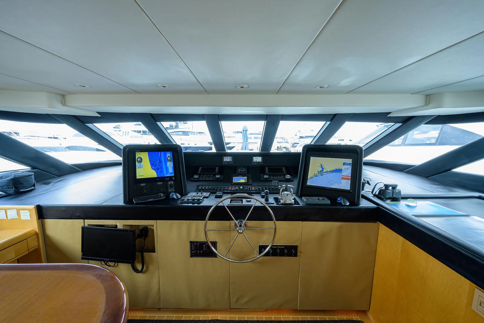 a control panel with several monitors aboard MEMORYMAKER Yacht for Sale