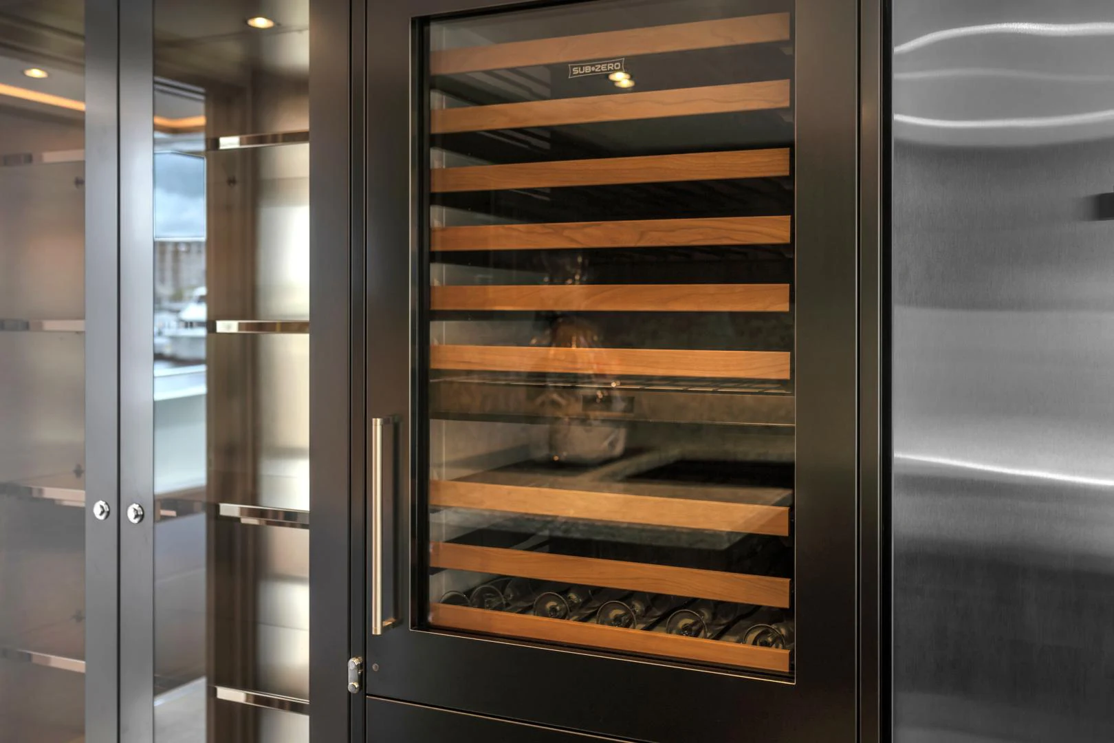 a glass door with a dog in it aboard CARBON COPY Yacht for Sale