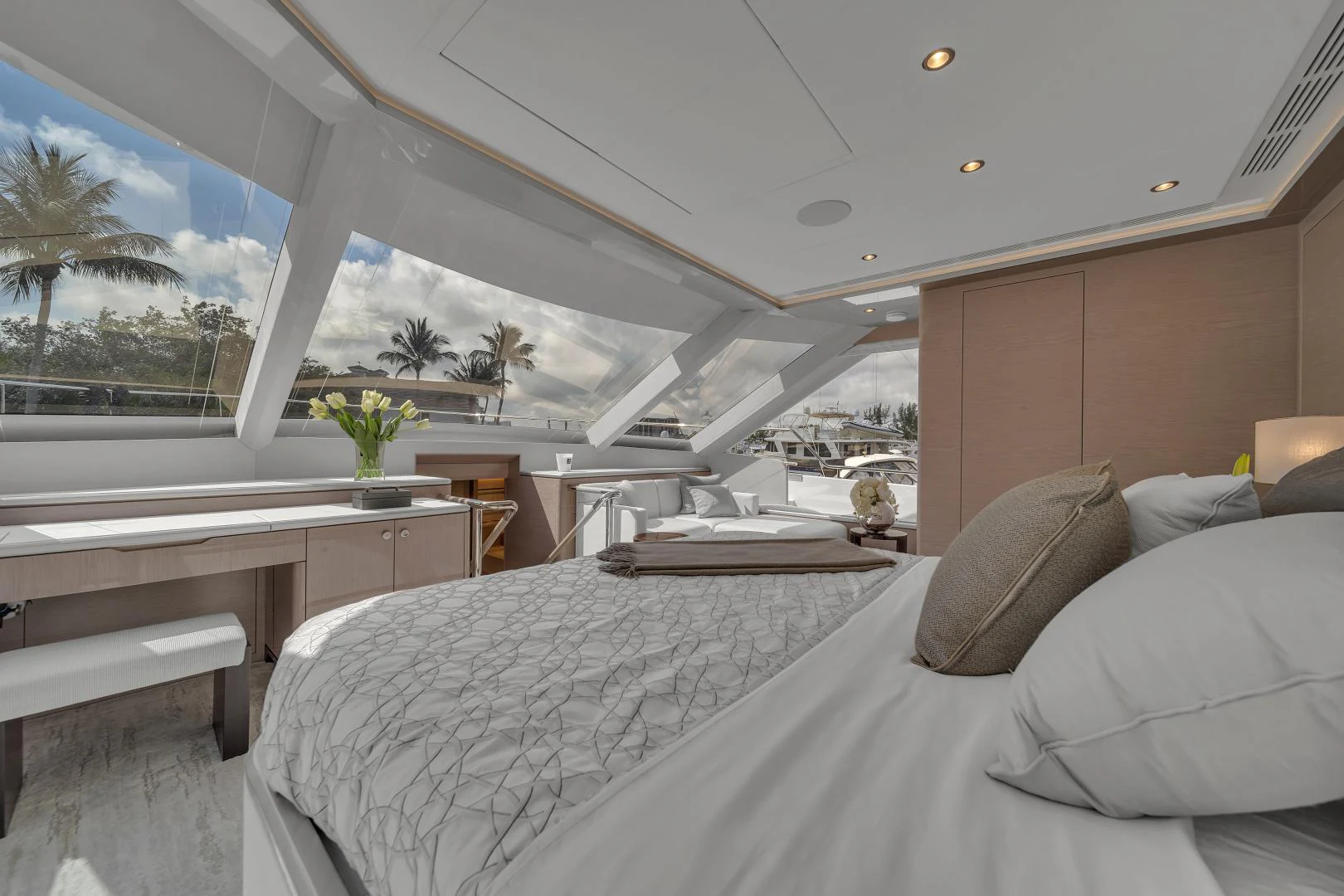 a room with a bed and a table aboard CARBON COPY Yacht for Sale