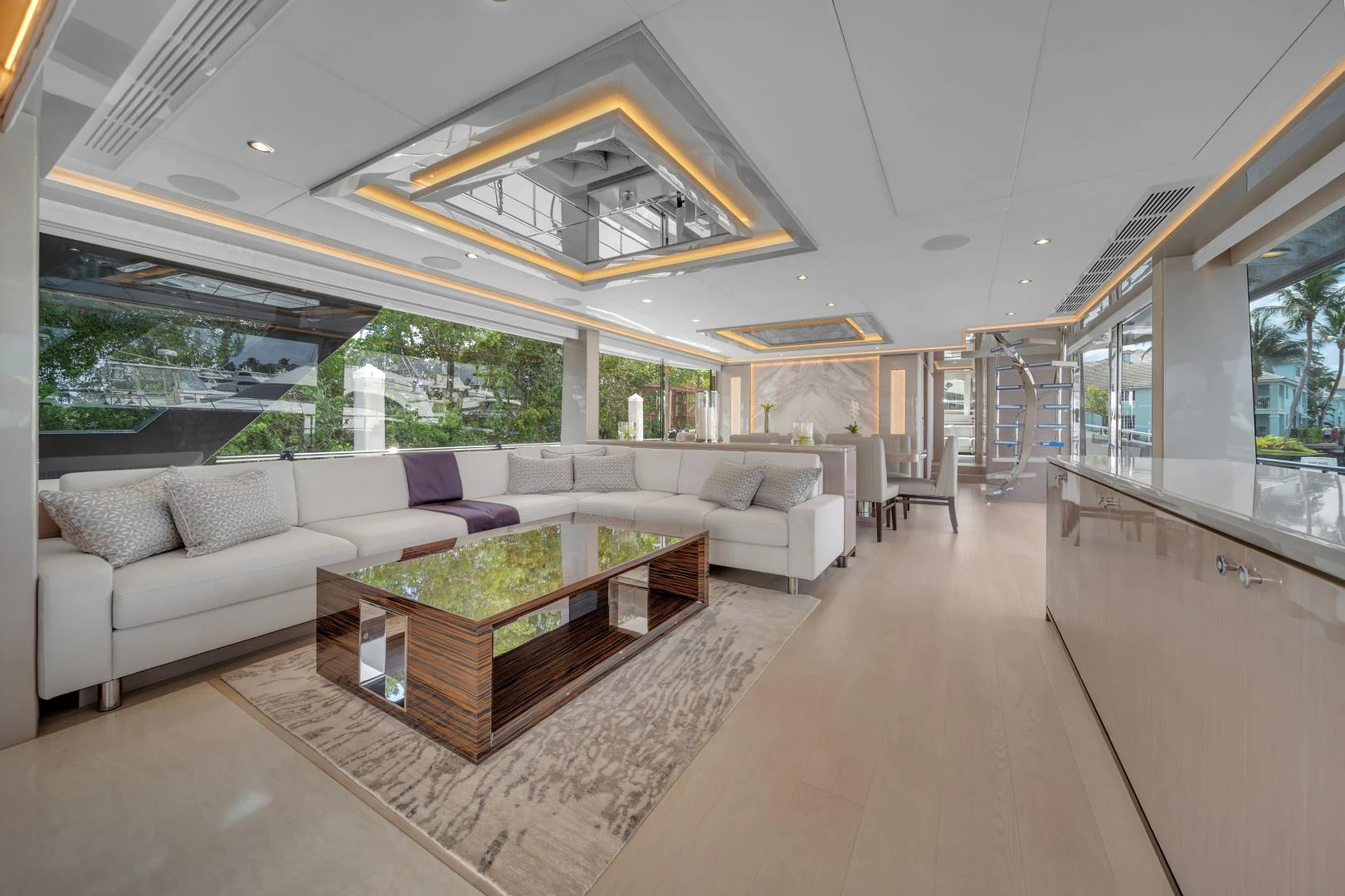 a living room with a large open window aboard CARBON COPY Yacht for Sale