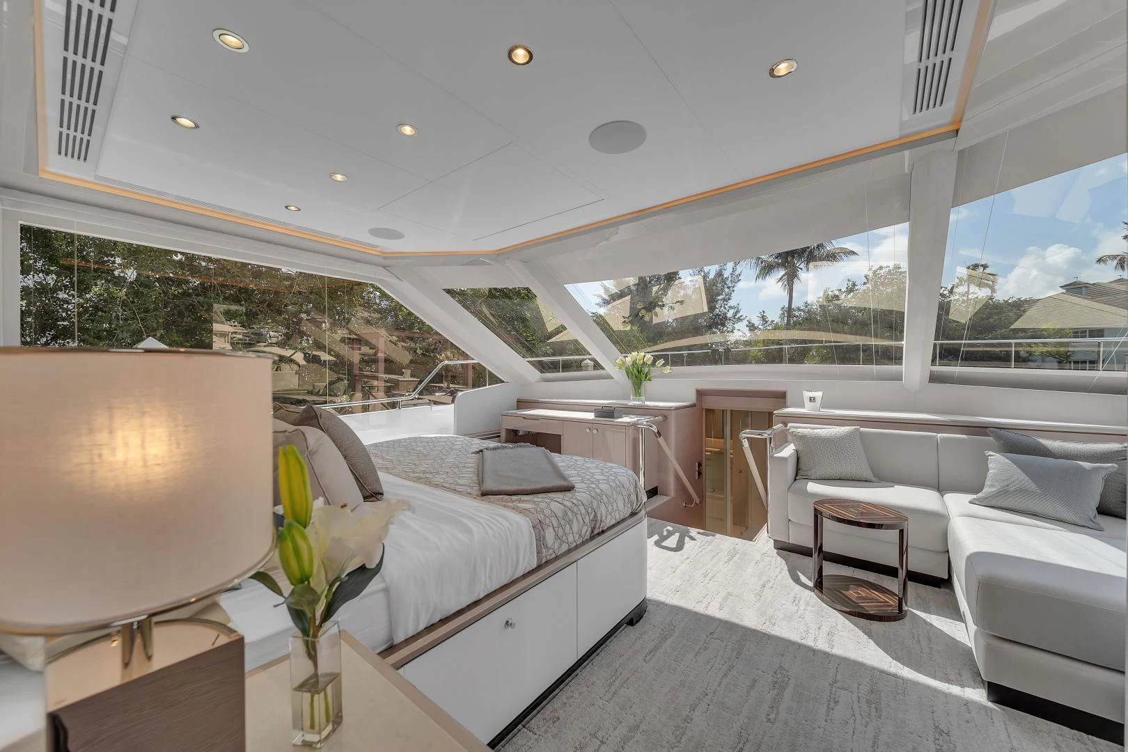 a room with a bed and a table aboard CARBON COPY Yacht for Sale