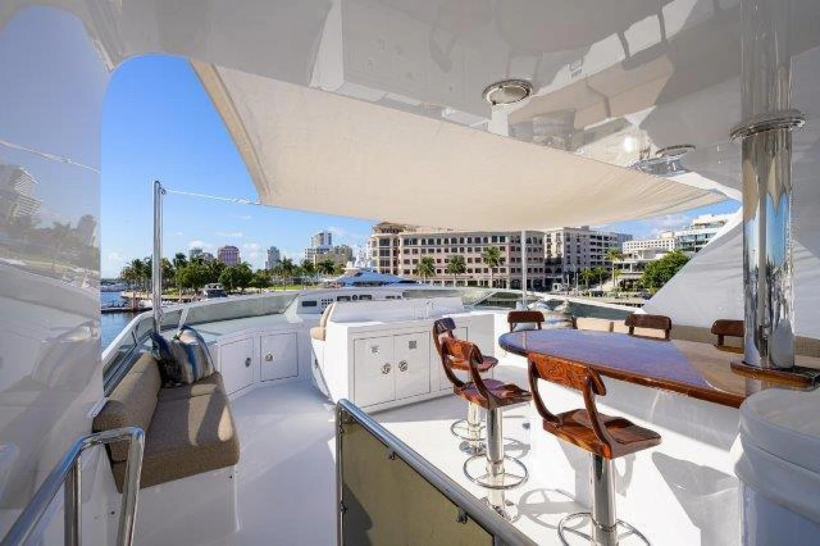 a room with a table and chairs aboard REBECCA Yacht for Sale