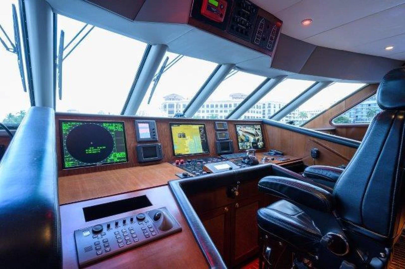 inside of a vehicle with a desk and computer aboard REBECCA Yacht for Sale