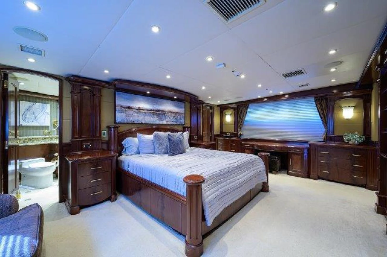 a bedroom with a large bed aboard REBECCA Yacht for Sale