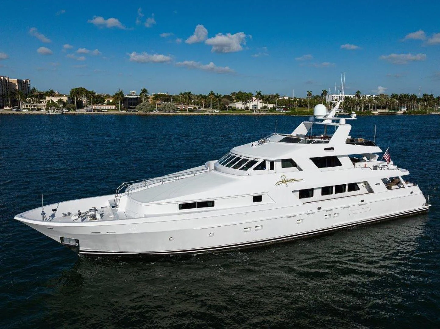 a white yacht in the water aboard REBECCA Yacht for Sale