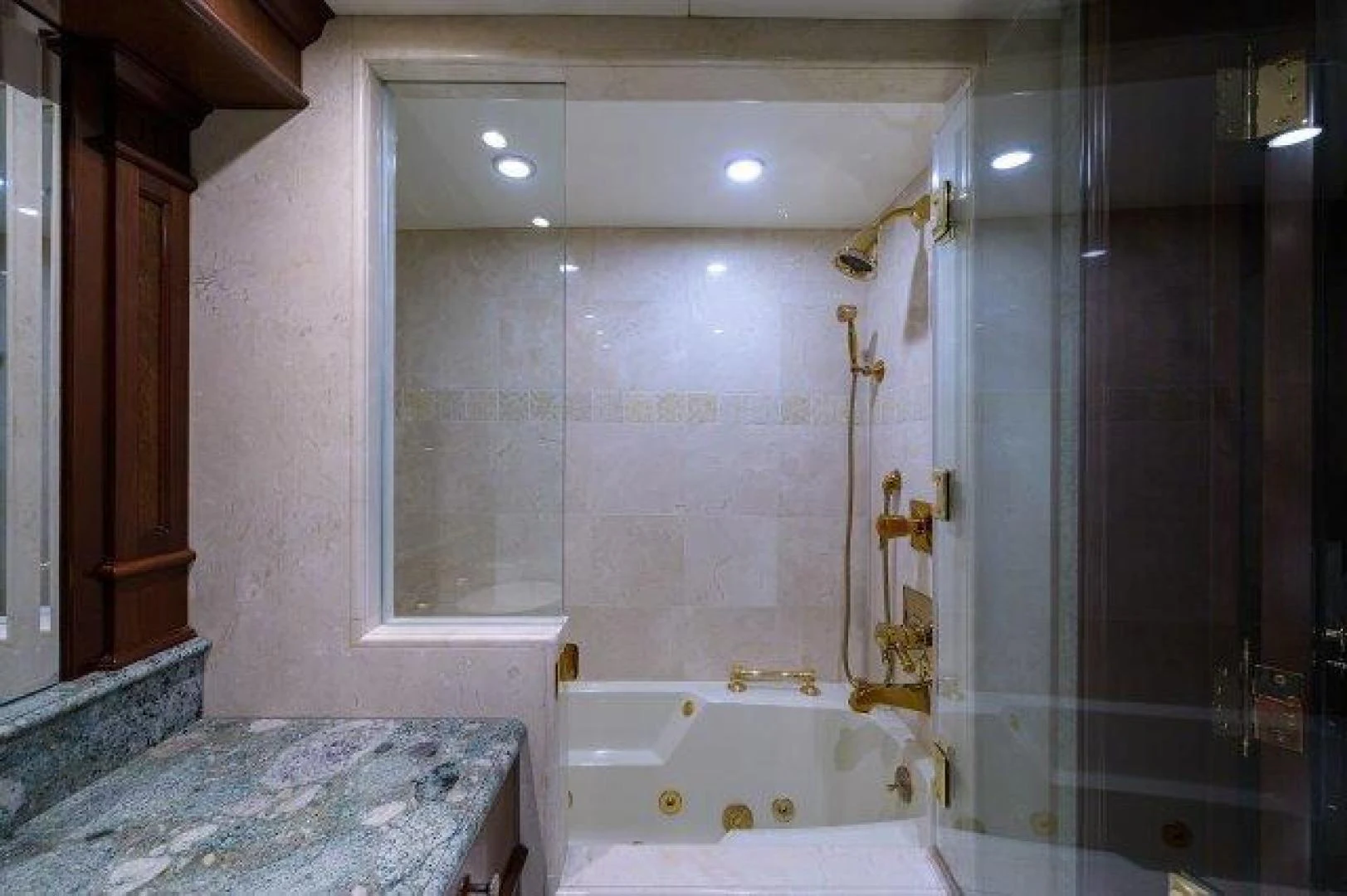 a bathtub in a bathroom aboard REBECCA Yacht for Sale