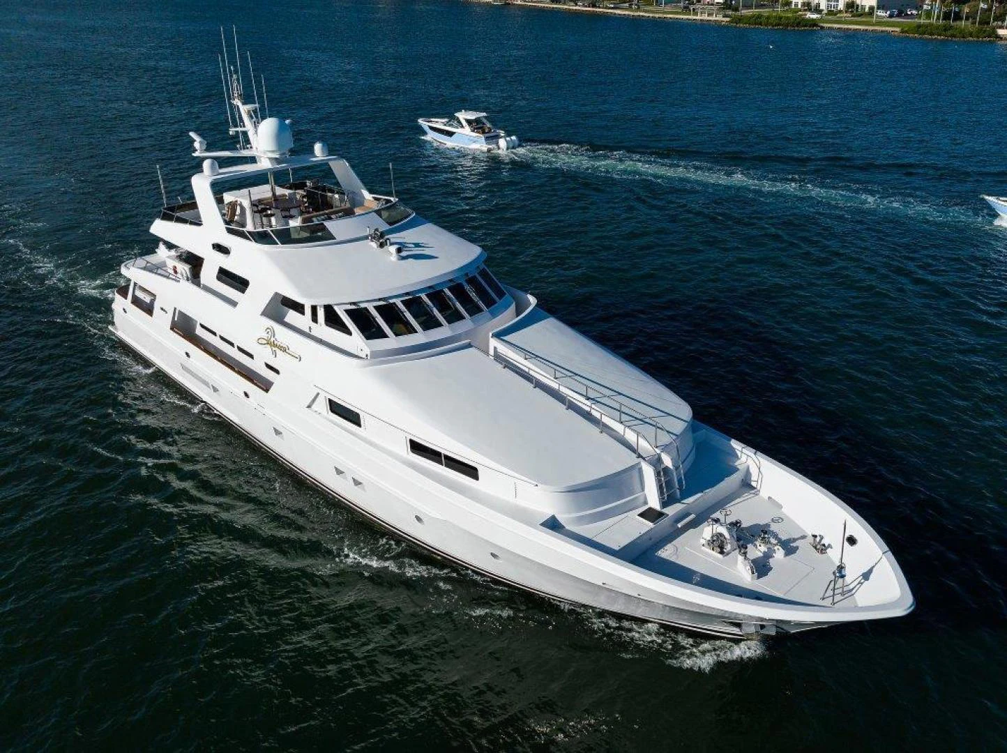 a white boat on the water aboard REBECCA Yacht for Sale