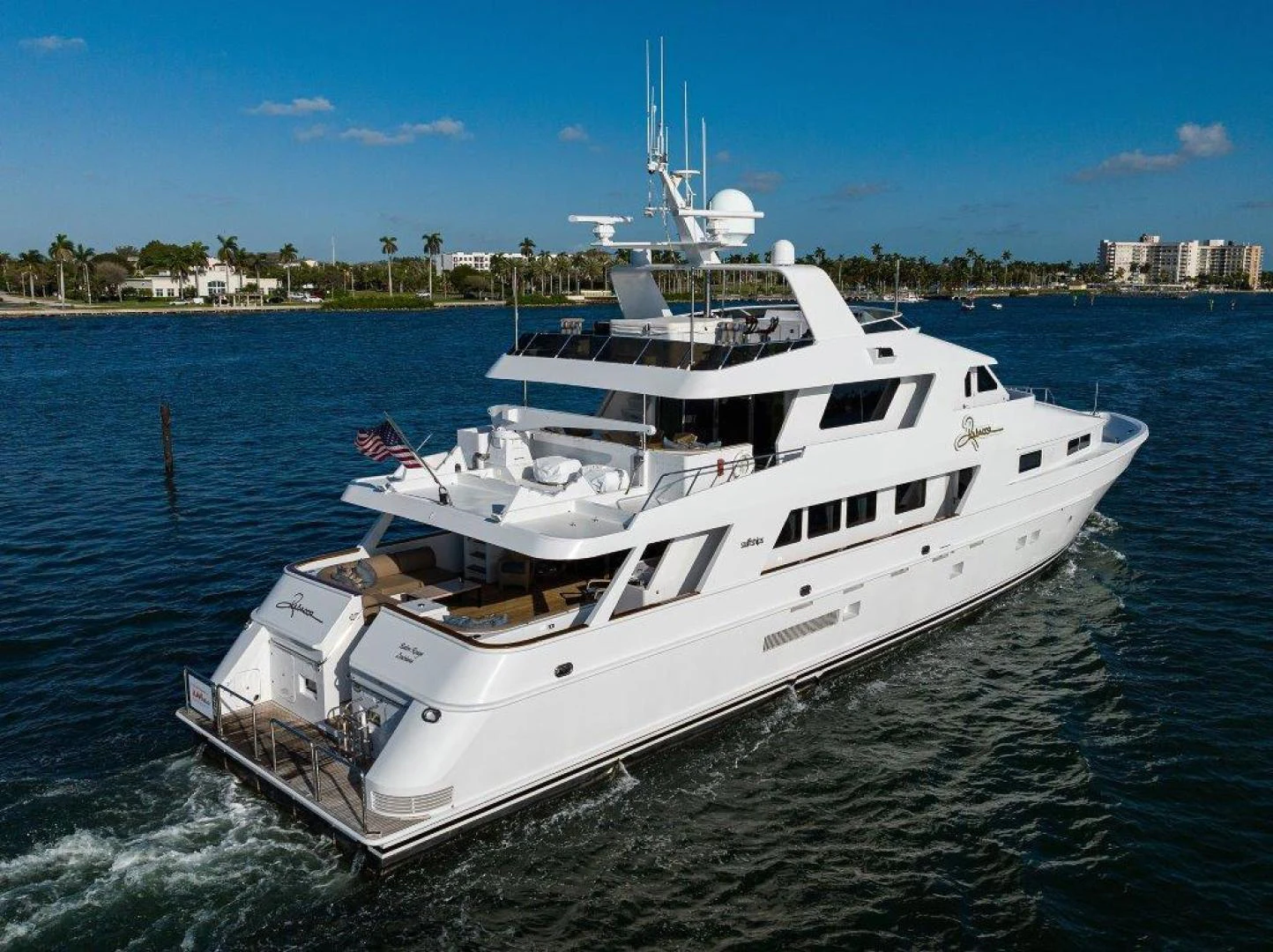 a white yacht on the water aboard REBECCA Yacht for Sale