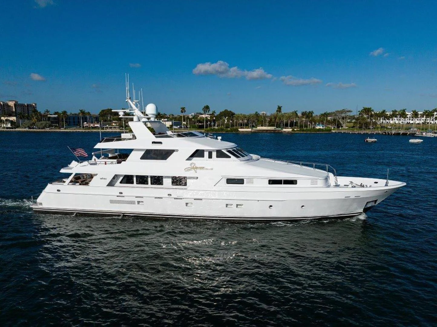 a white yacht in the water aboard REBECCA Yacht for Sale