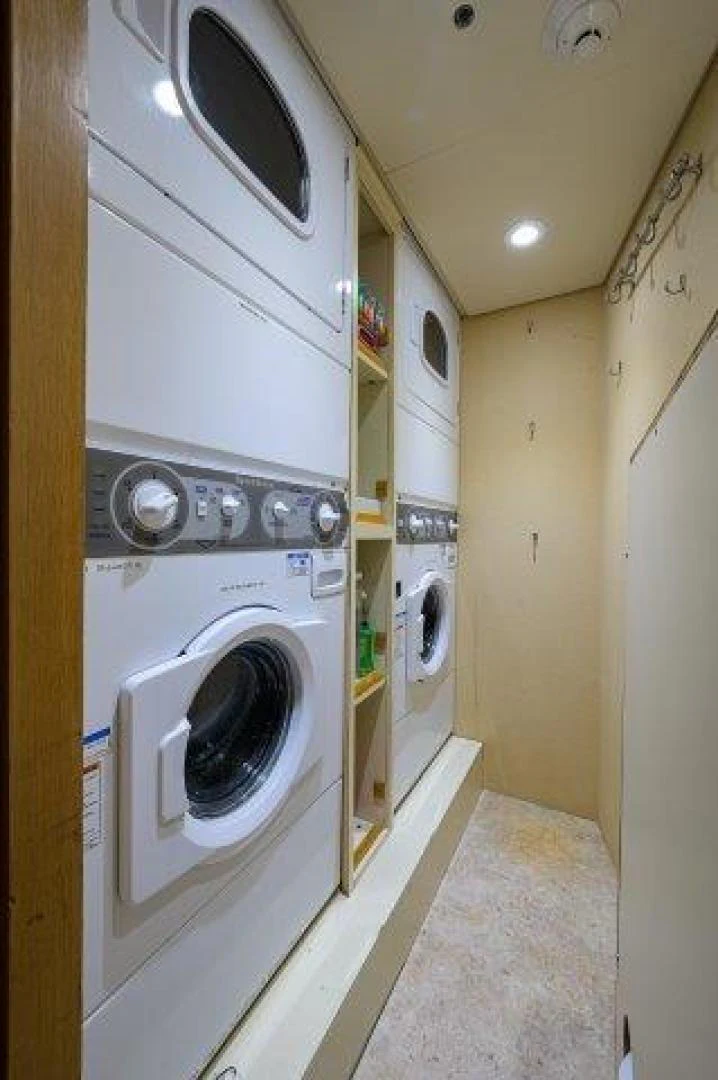 a washing machine in a room aboard REBECCA Yacht for Sale