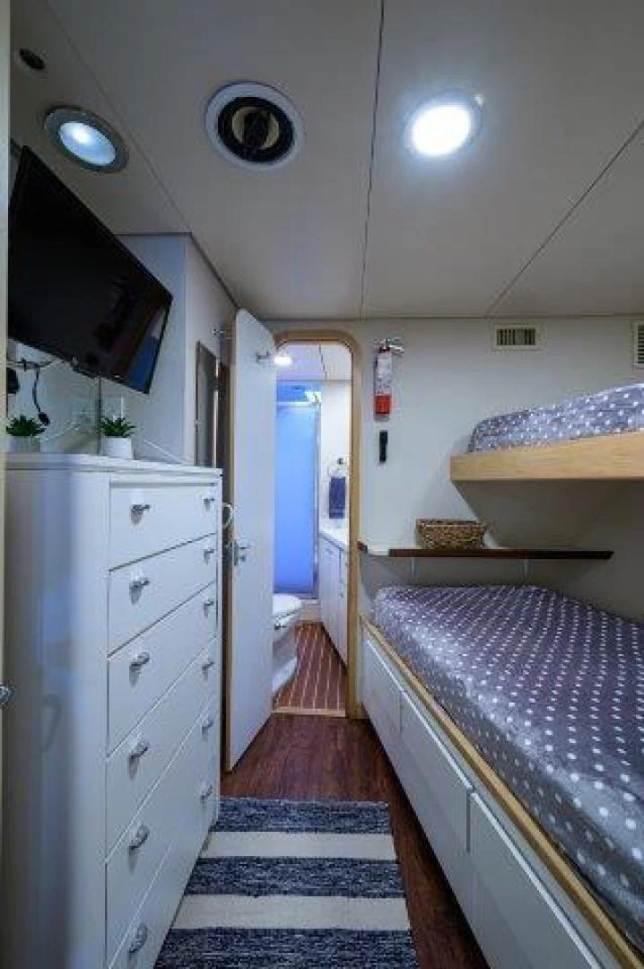 a bathroom with a sink and a bathtub aboard REBECCA Yacht for Sale