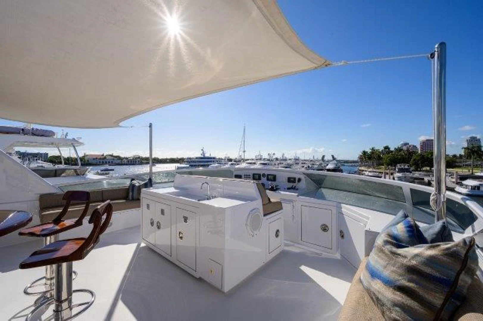 a deck with a deck and chairs aboard REBECCA Yacht for Sale