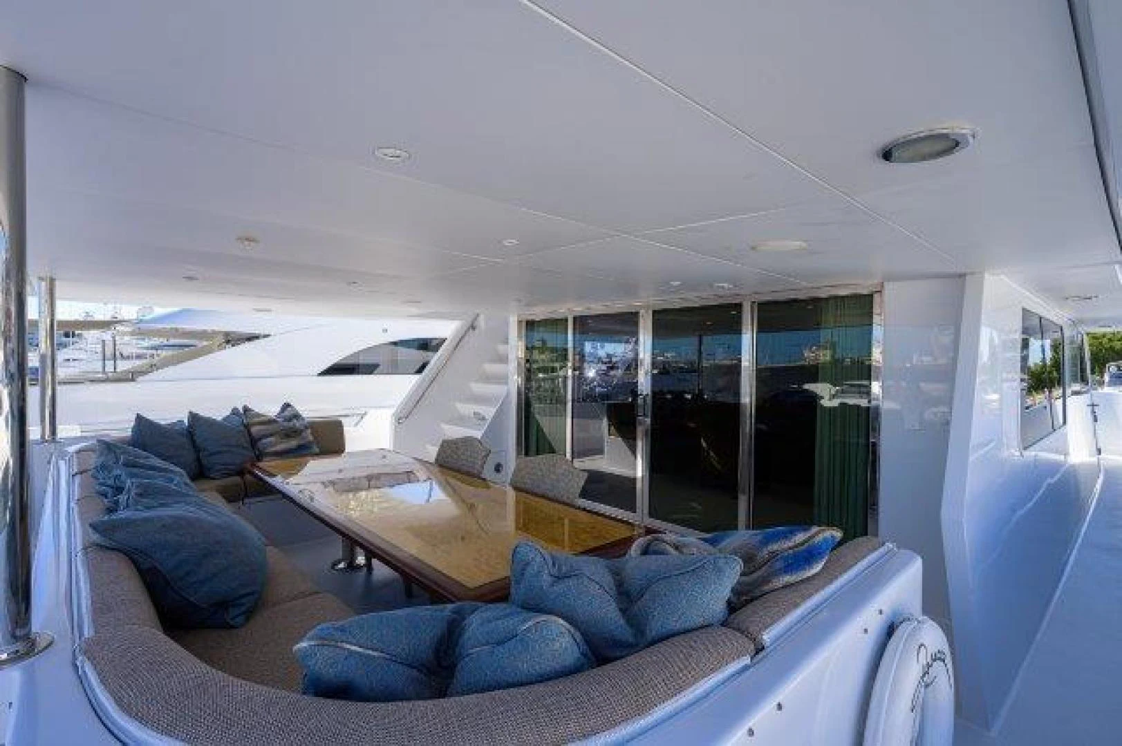 a living room with a large window aboard REBECCA Yacht for Sale
