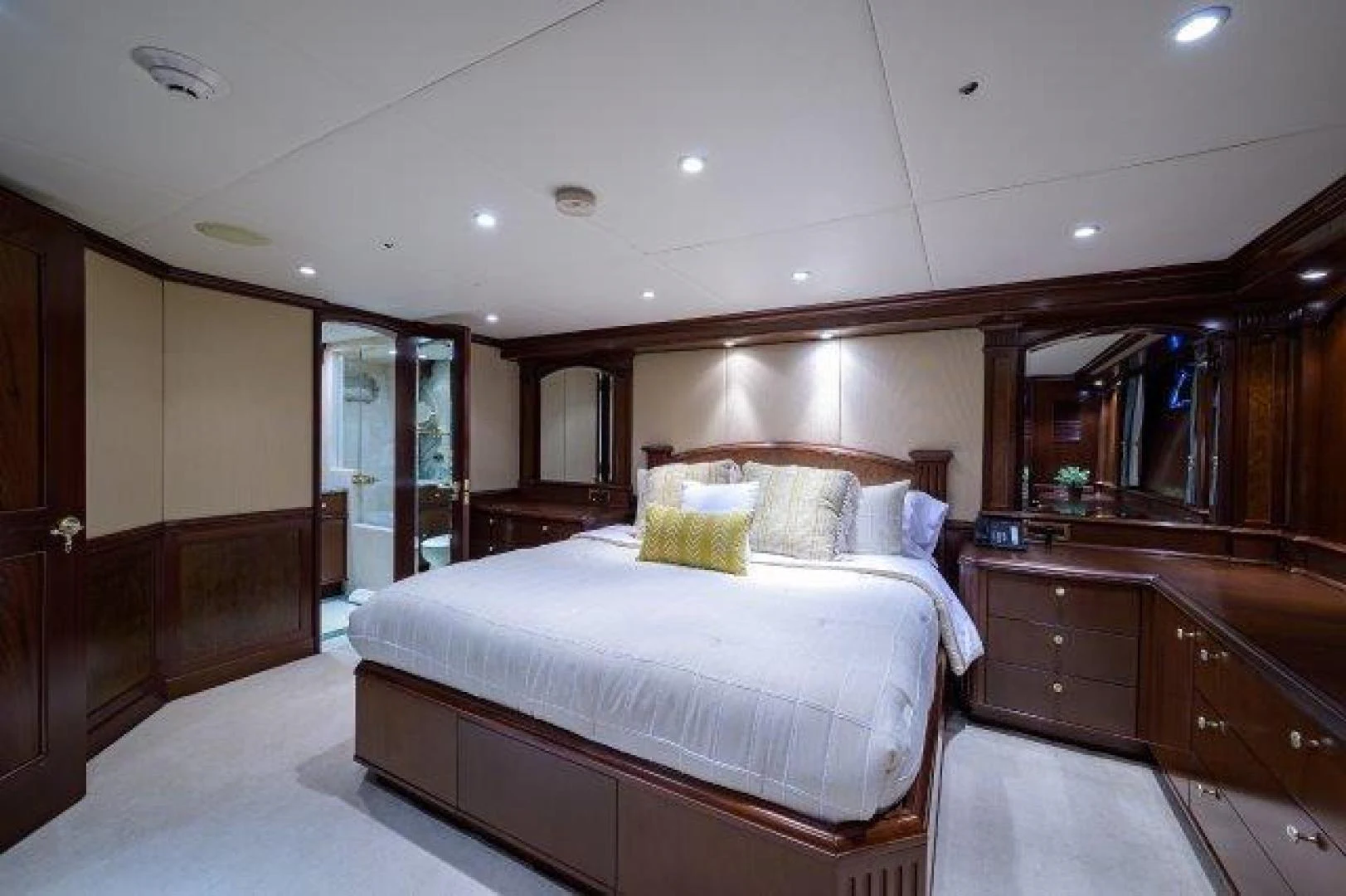 a large bedroom with a large bed aboard REBECCA Yacht for Sale
