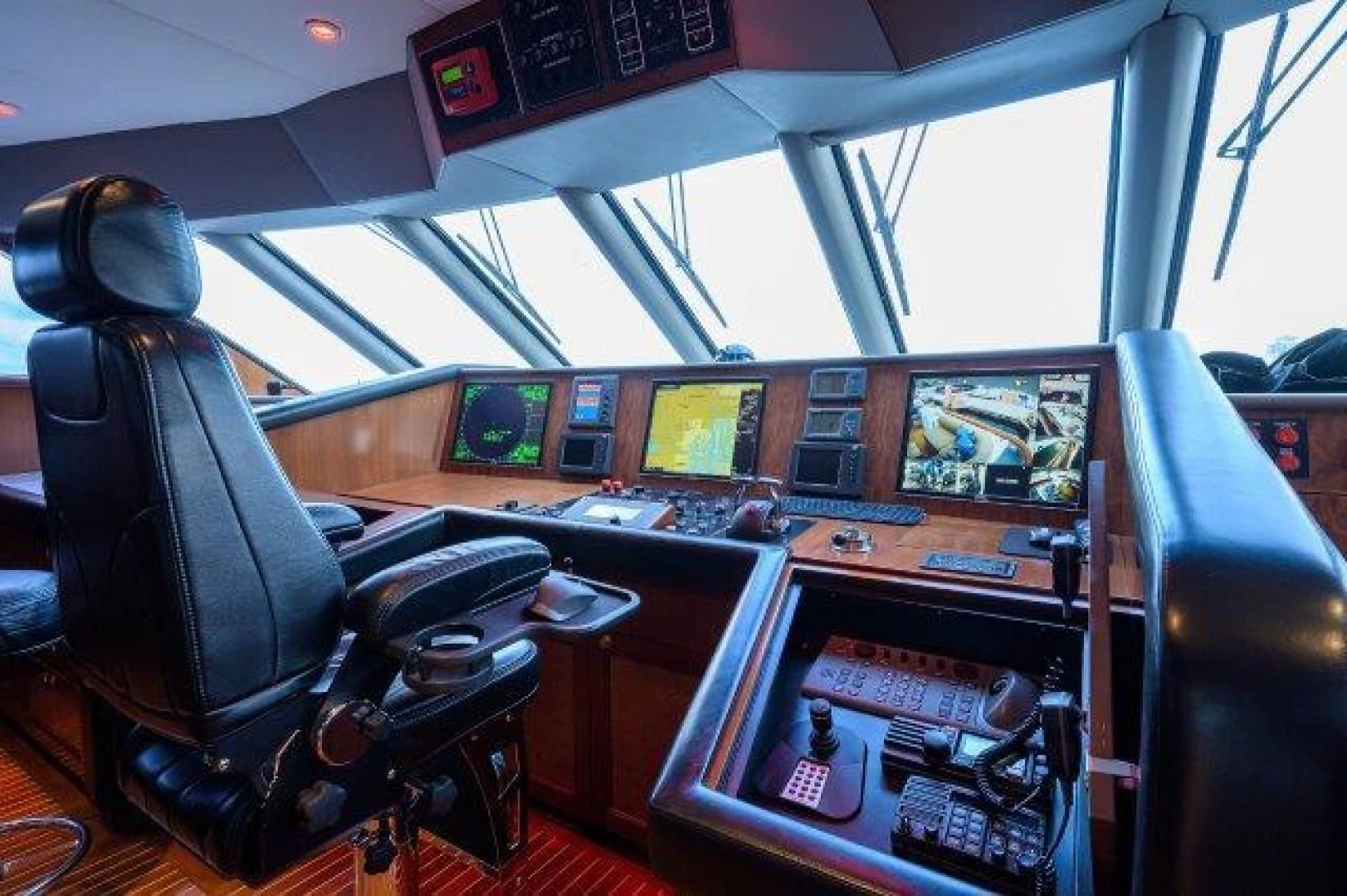 a vehicle with a seat and steering wheel aboard REBECCA Yacht for Sale