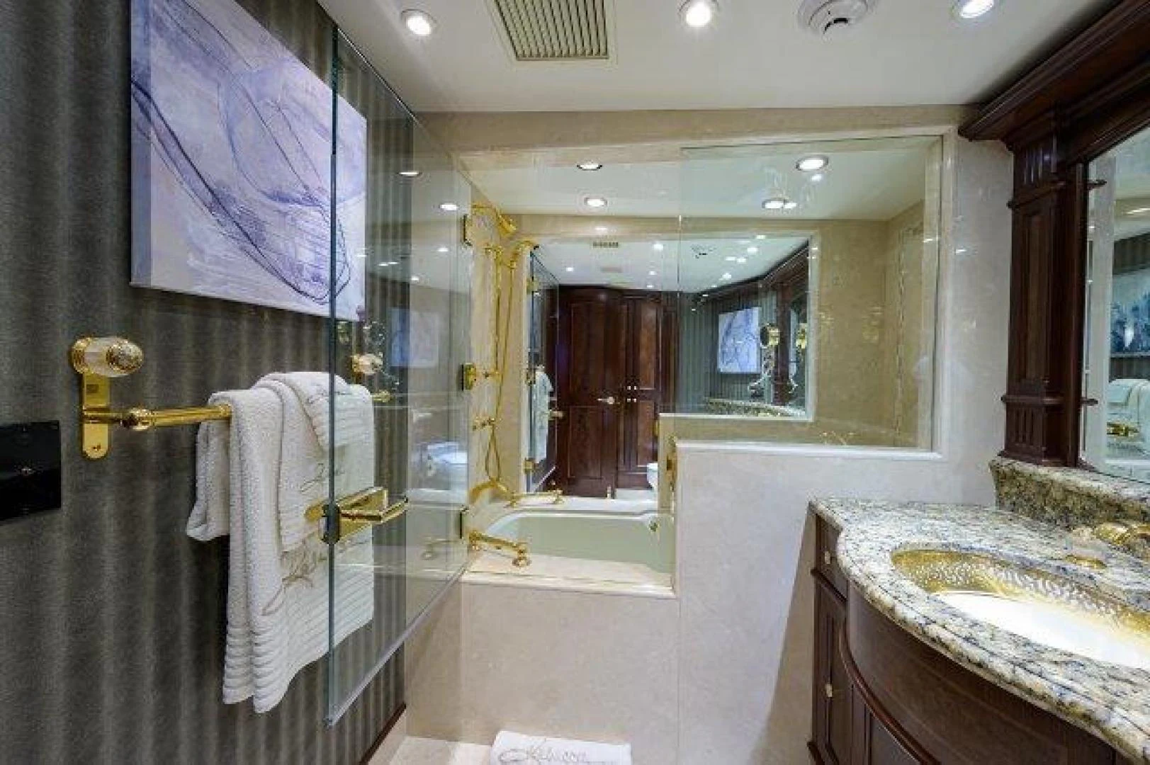 a bathroom with a shower and sink aboard REBECCA Yacht for Sale