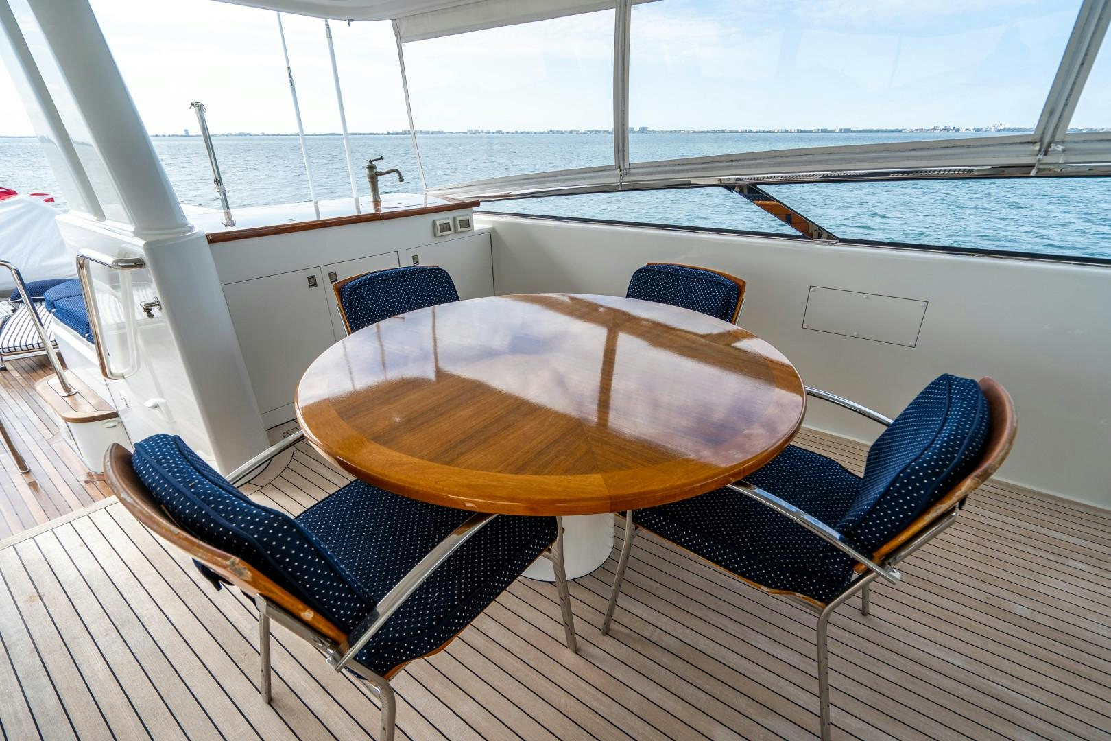 a table on a boat aboard LEGACY Yacht for Sale