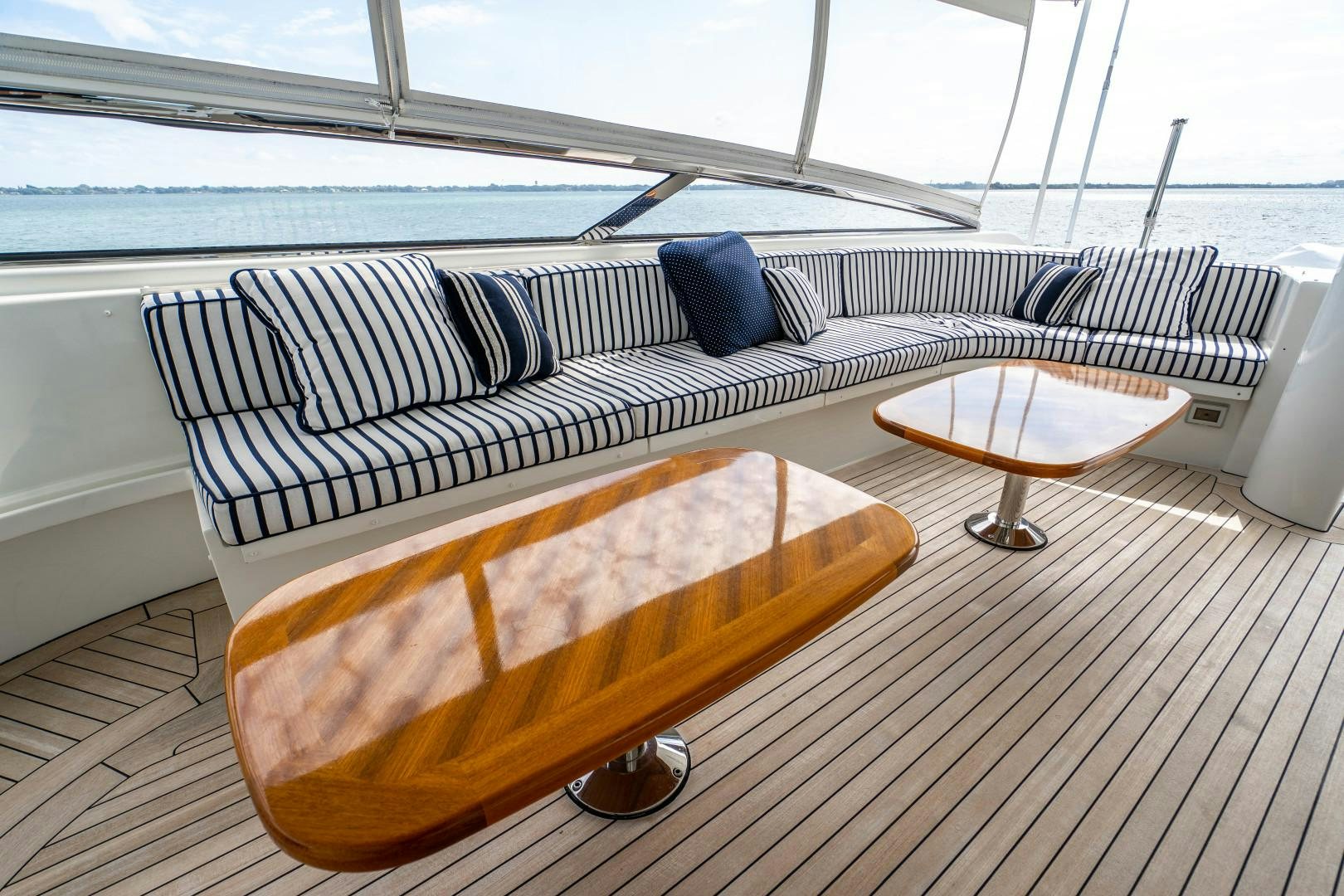 a couch on a deck aboard LEGACY Yacht for Sale