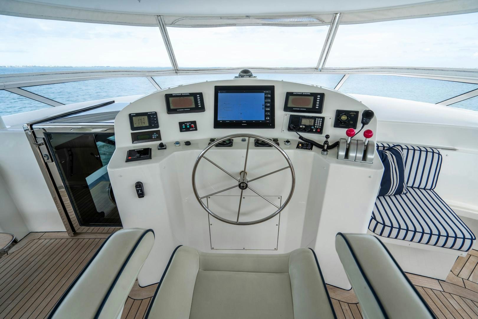 inside of a car aboard LEGACY Yacht for Sale