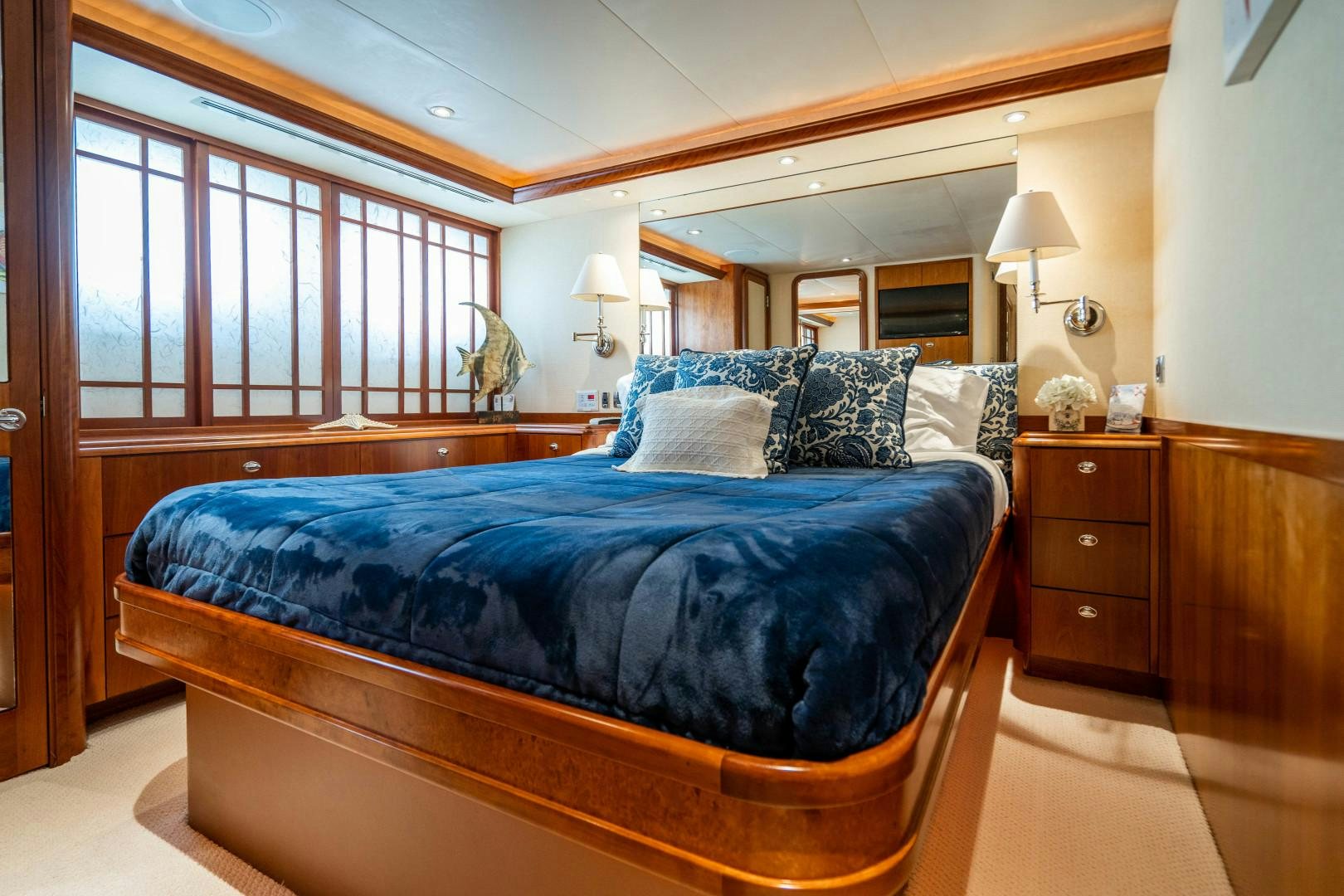 a bed in a room aboard LEGACY Yacht for Sale