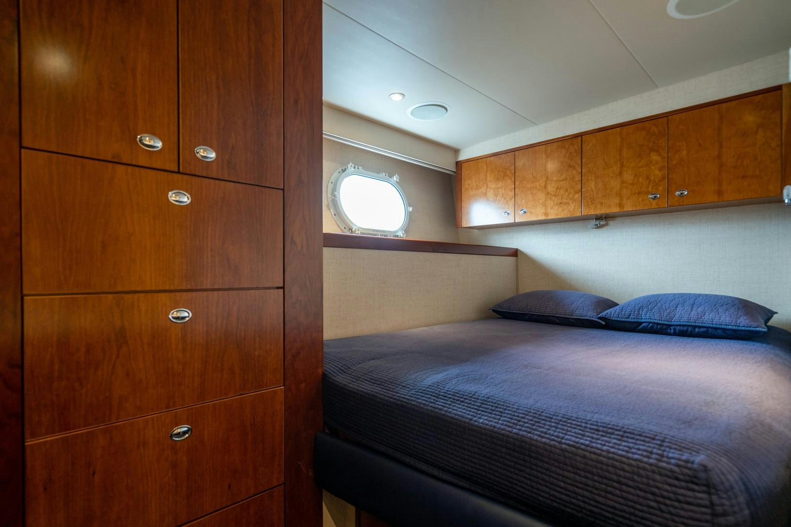 a bed in a room aboard LEGACY Yacht for Sale