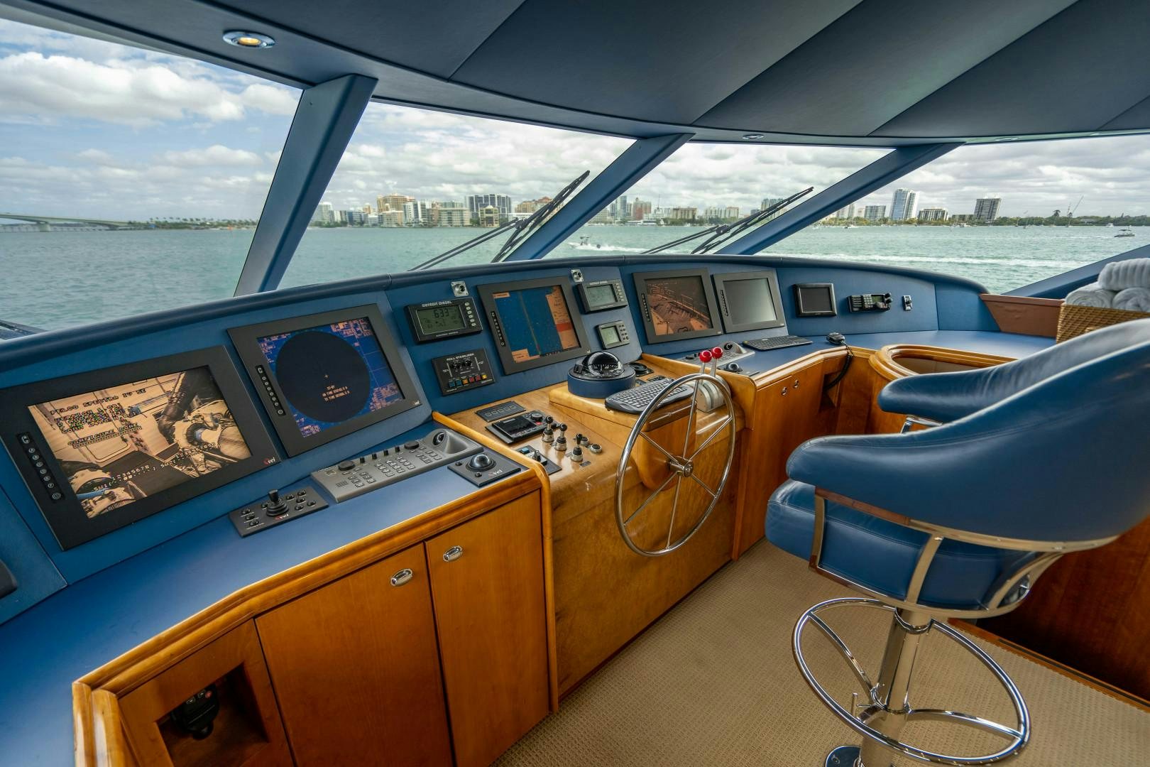a boat with a large screen aboard LEGACY Yacht for Sale