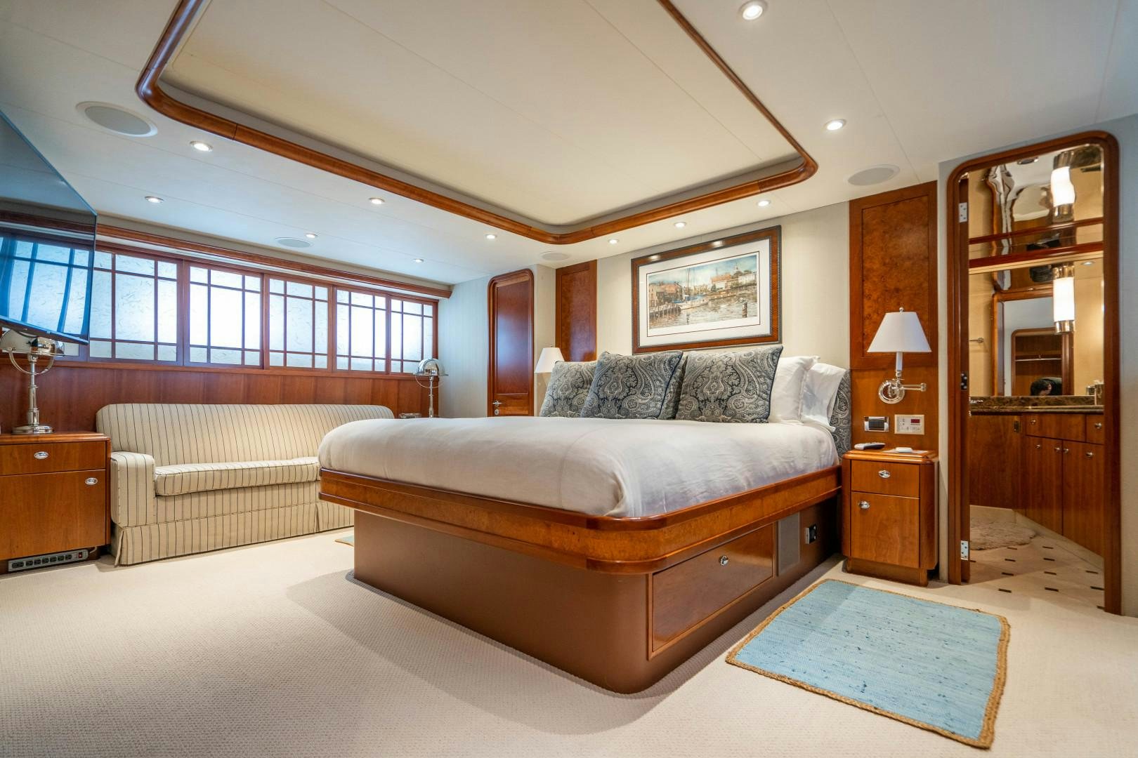 a large bedroom with a large bed aboard LEGACY Yacht for Sale
