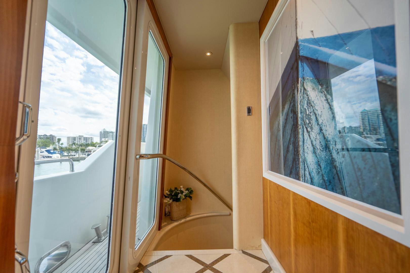 a door leading to a balcony aboard LEGACY Yacht for Sale