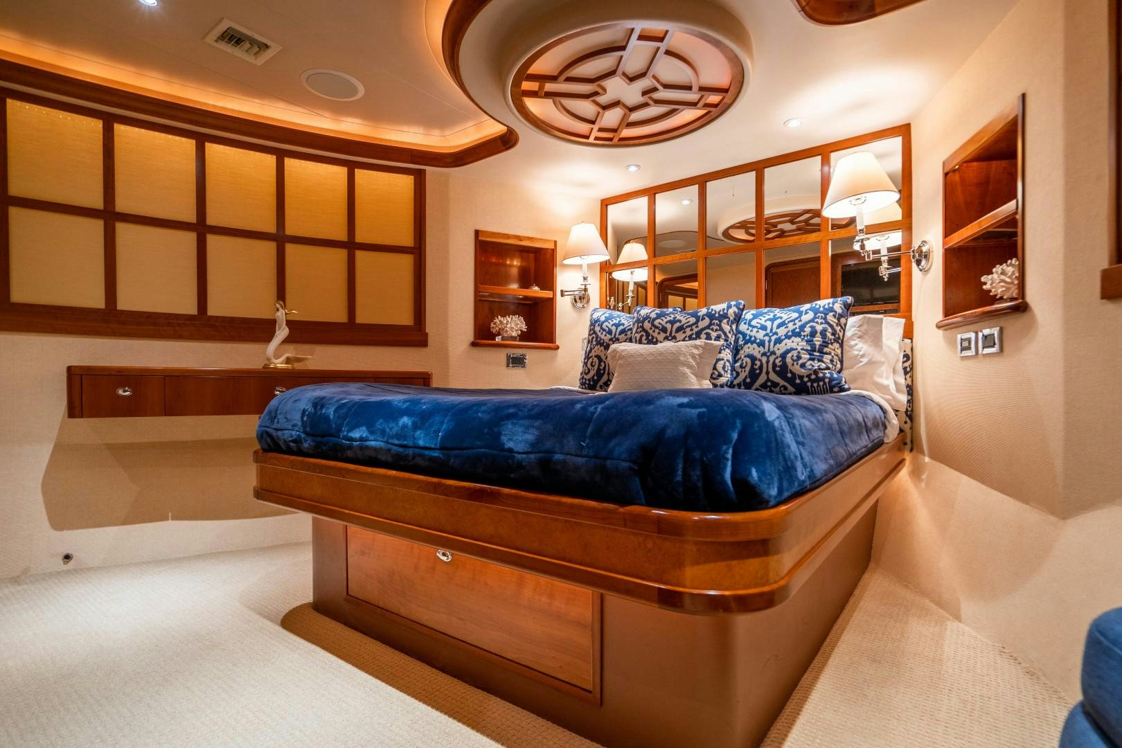 a bedroom with a bed aboard LEGACY Yacht for Sale