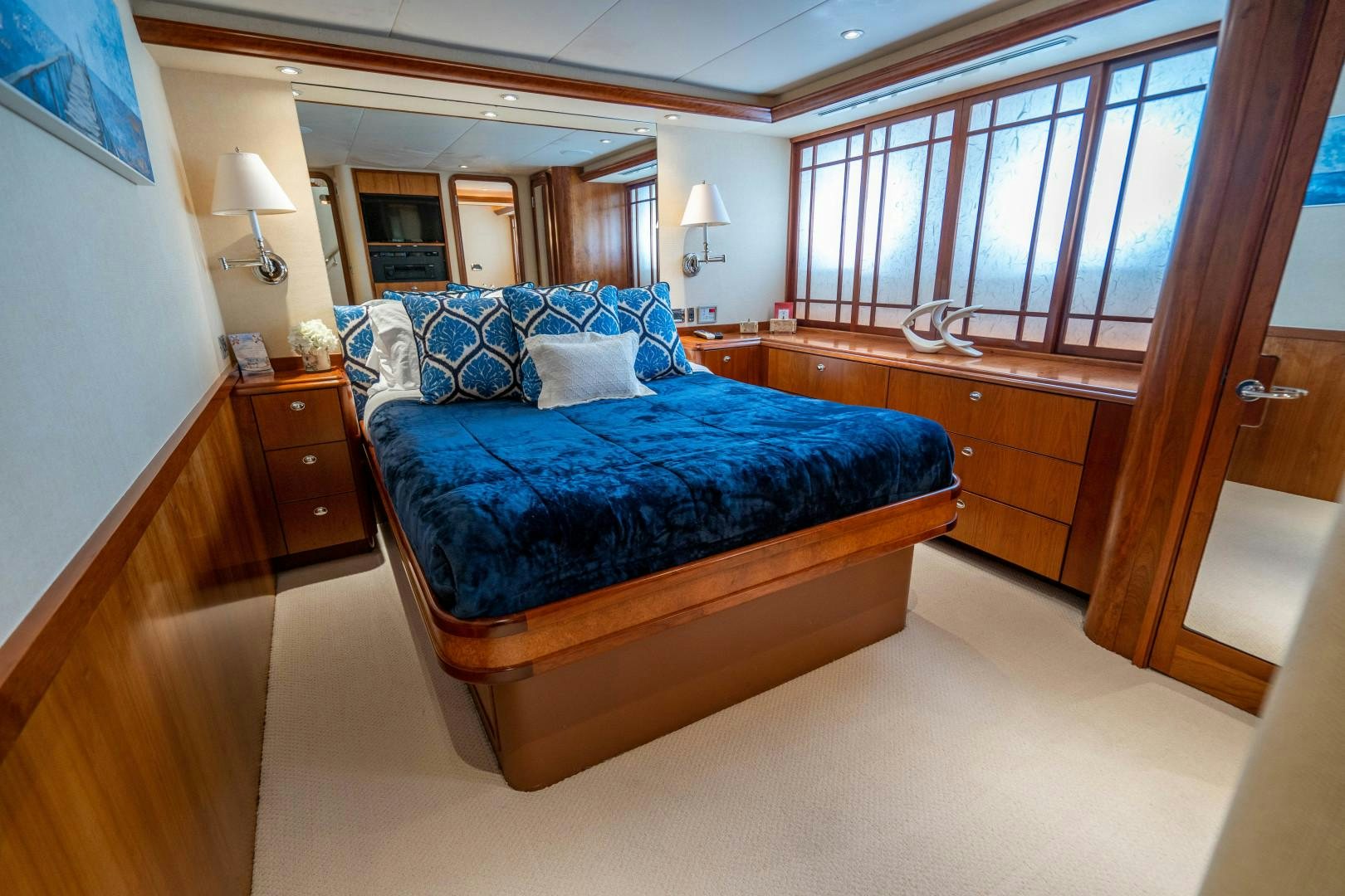 a bed in a room aboard LEGACY Yacht for Sale