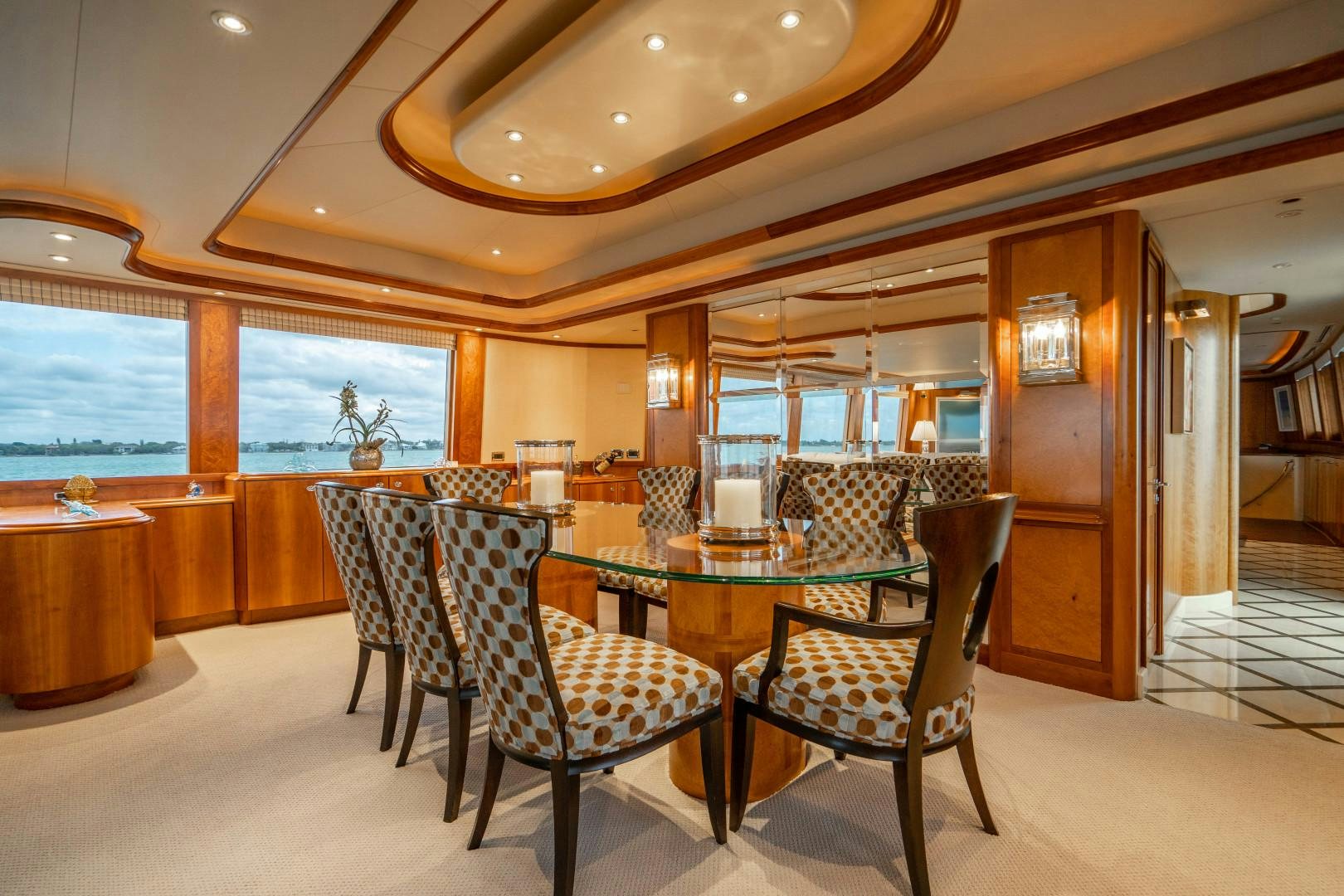 a dining room with a table and chairs aboard LEGACY Yacht for Sale