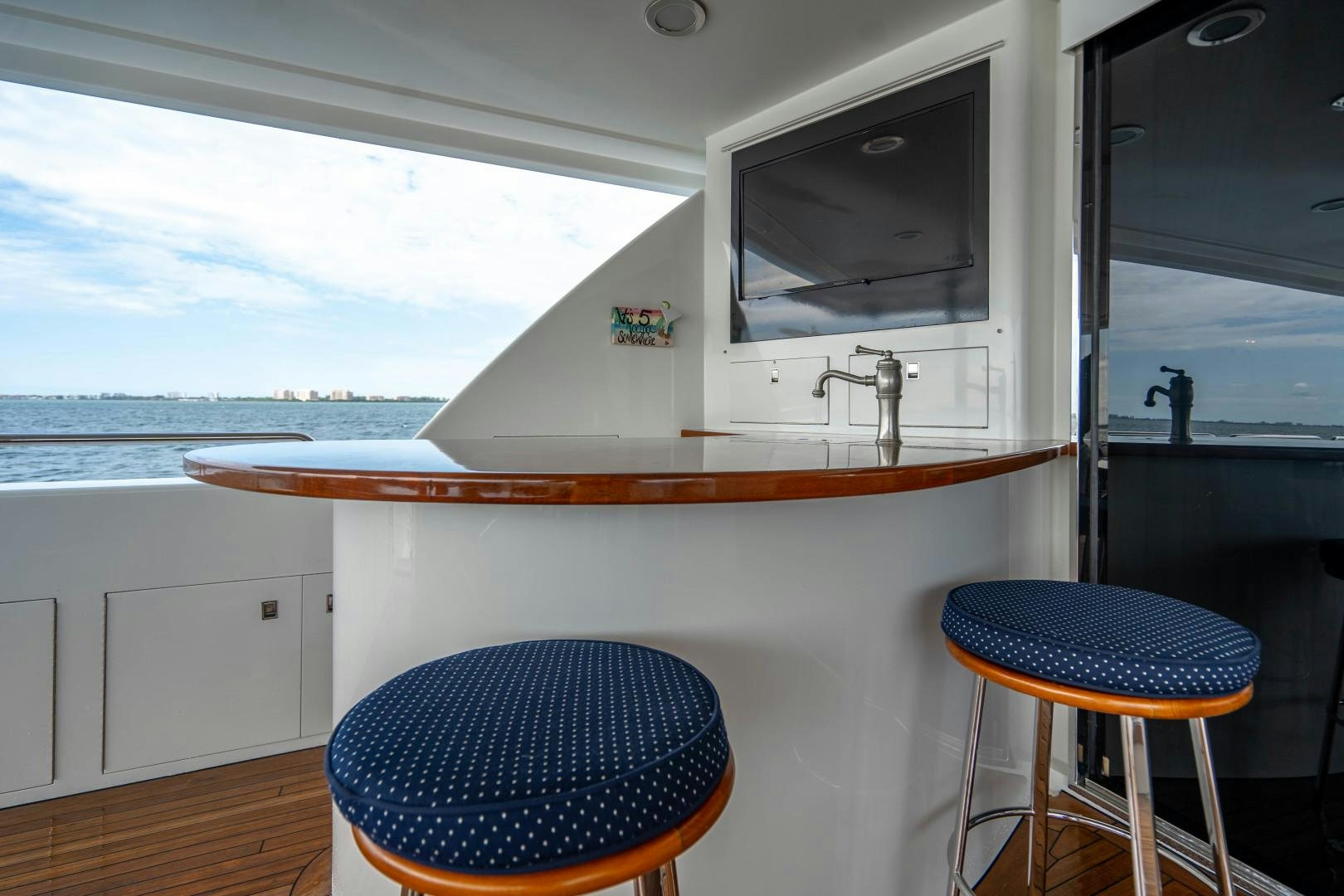 a bathroom with a large window aboard LEGACY Yacht for Sale