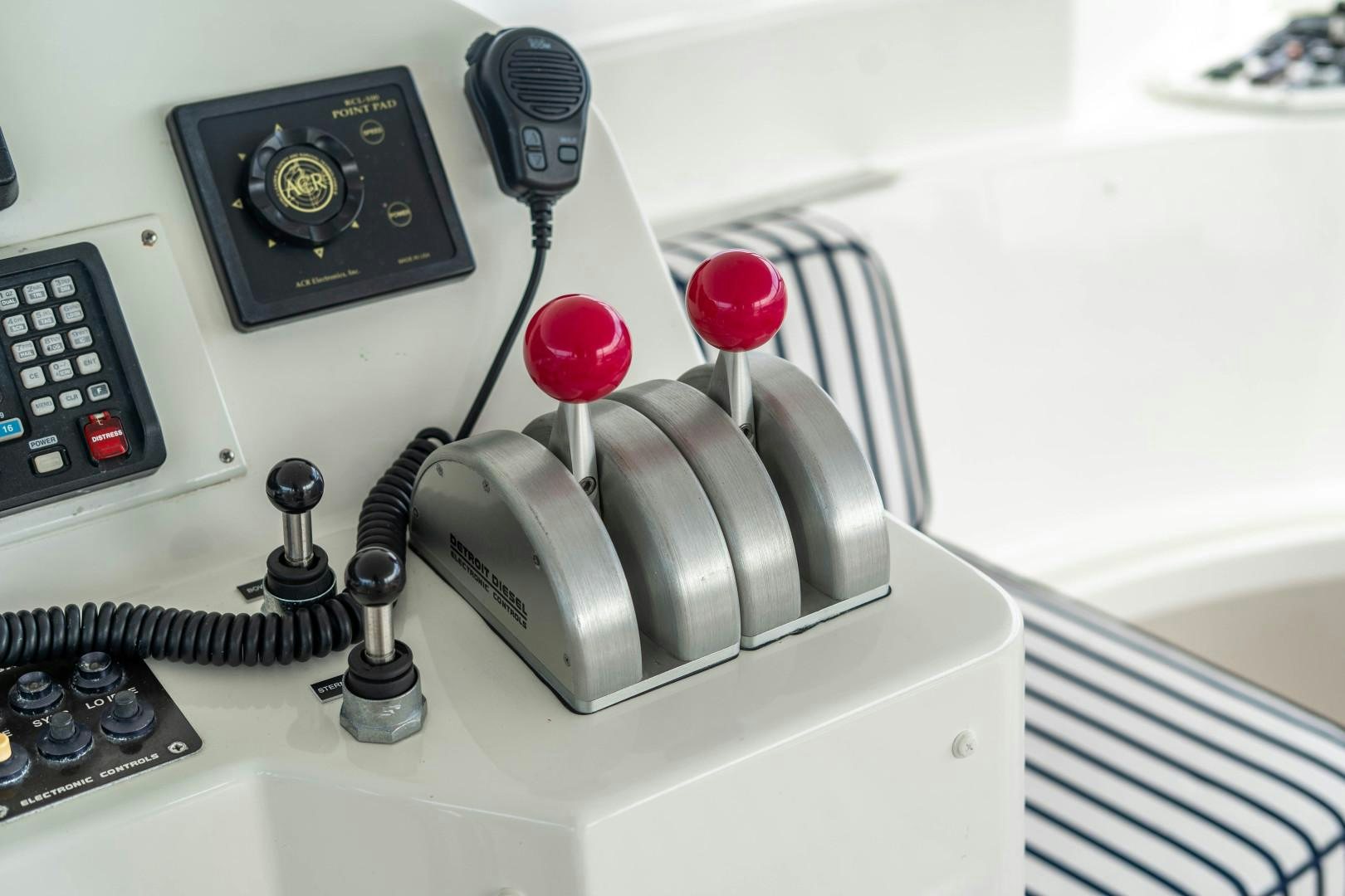 a telephone on a table aboard LEGACY Yacht for Sale