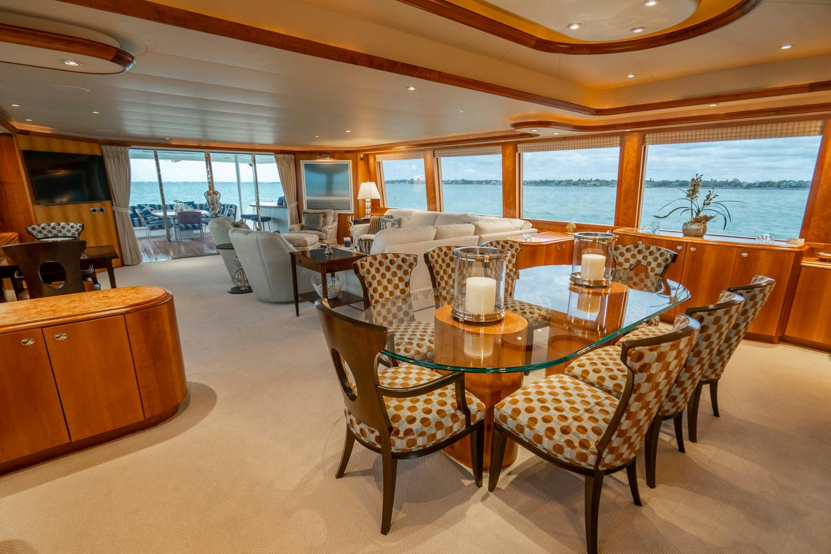 a dining room with a large table aboard LEGACY Yacht for Sale