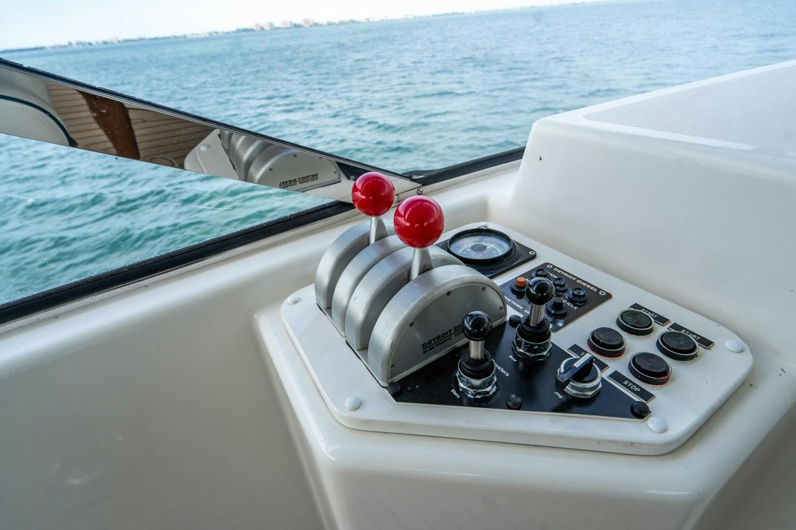 a boat with a red ball in the water aboard LEGACY Yacht for Sale