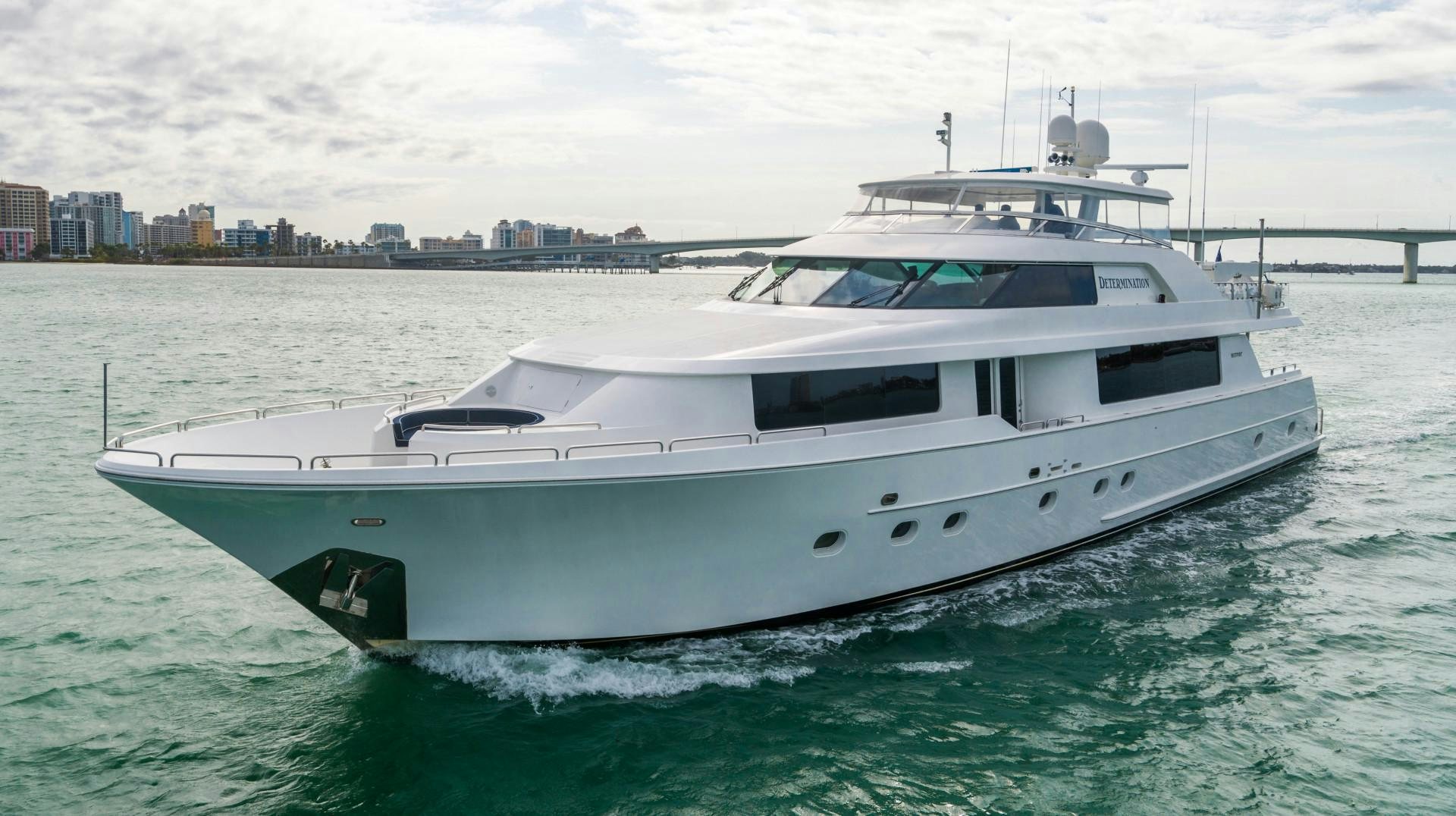 a white yacht on the water aboard LEGACY Yacht for Sale