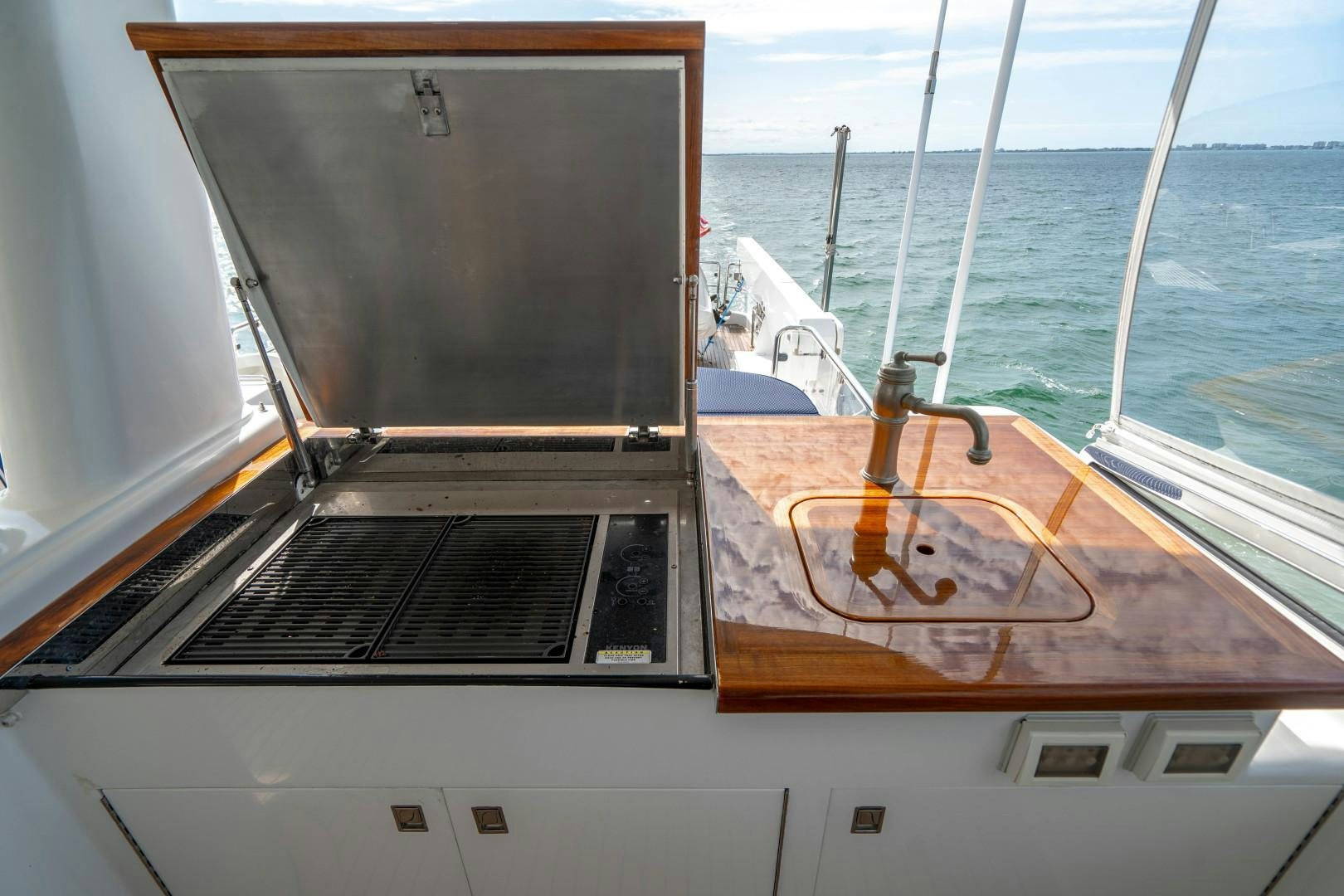 a boat with a large flat screen aboard LEGACY Yacht for Sale