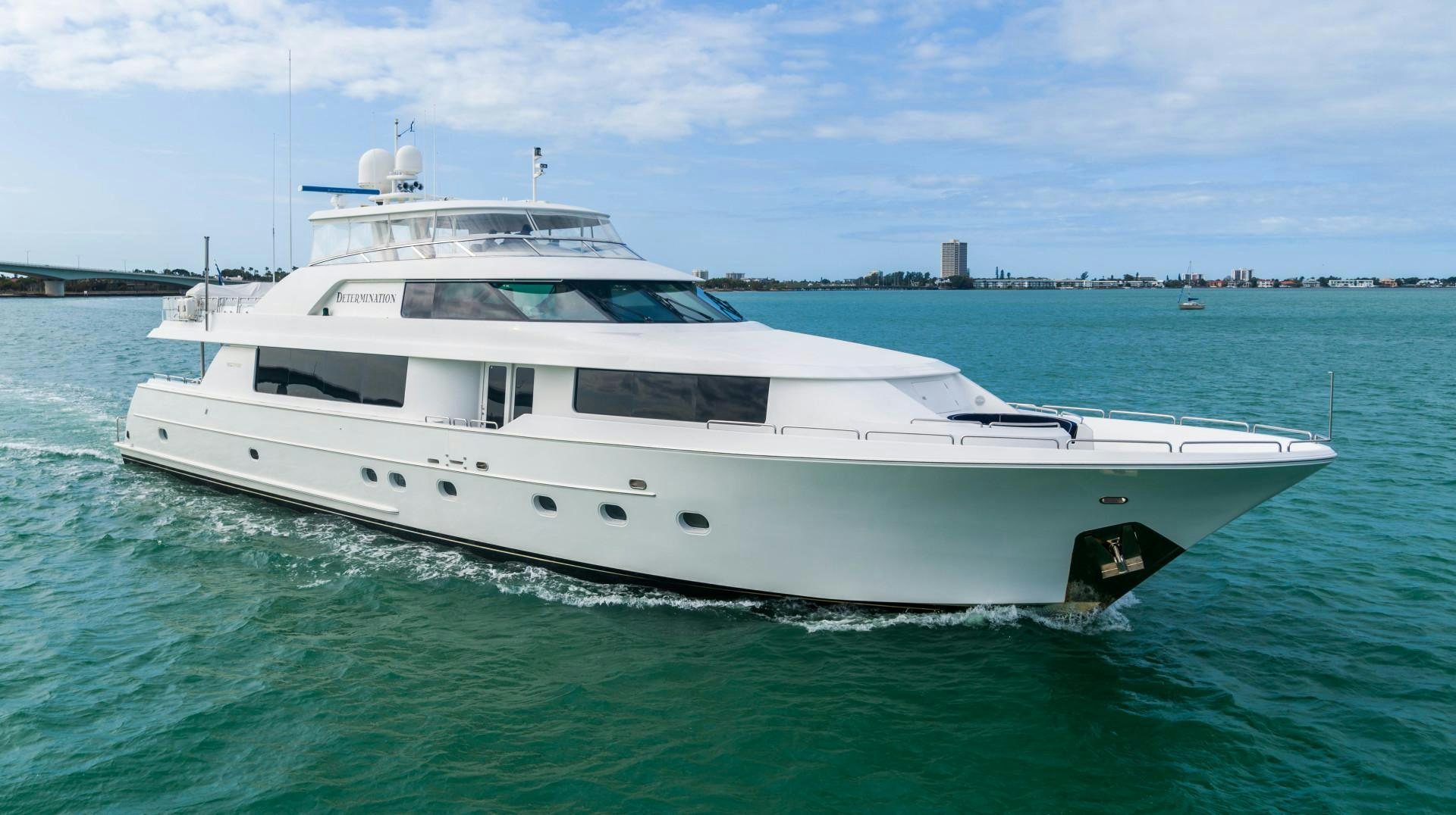 a white yacht in the water aboard LEGACY Yacht for Sale