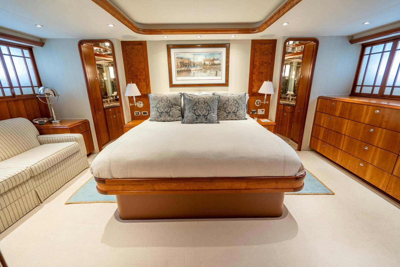 a large bed in a hotel room aboard LEGACY Yacht for Sale