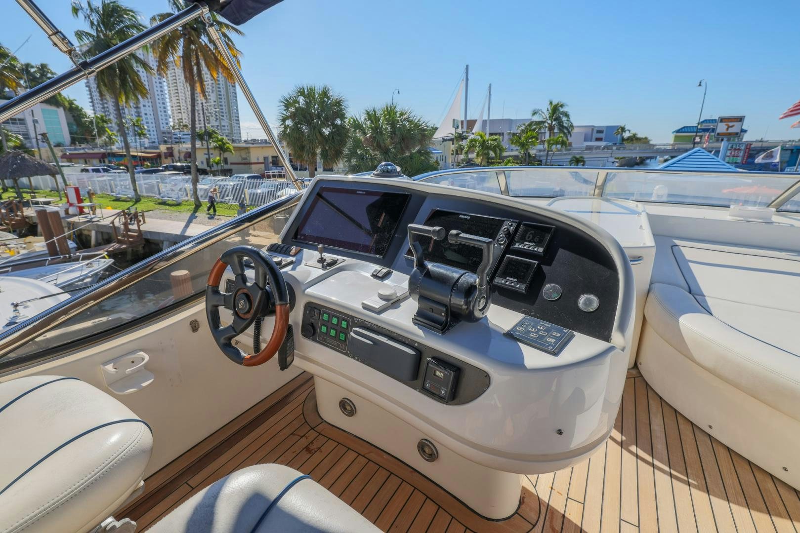 a white car on a boat aboard SIROCCO Yacht for Sale