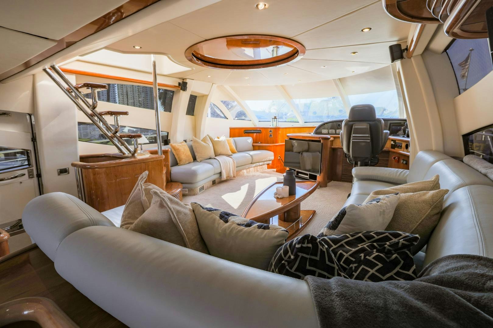 a large living room with a large window aboard SIROCCO Yacht for Sale