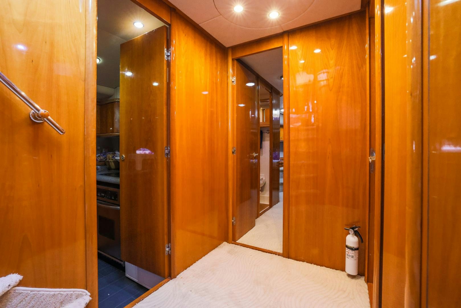 a room with a bed and a large closet aboard SIROCCO Yacht for Sale