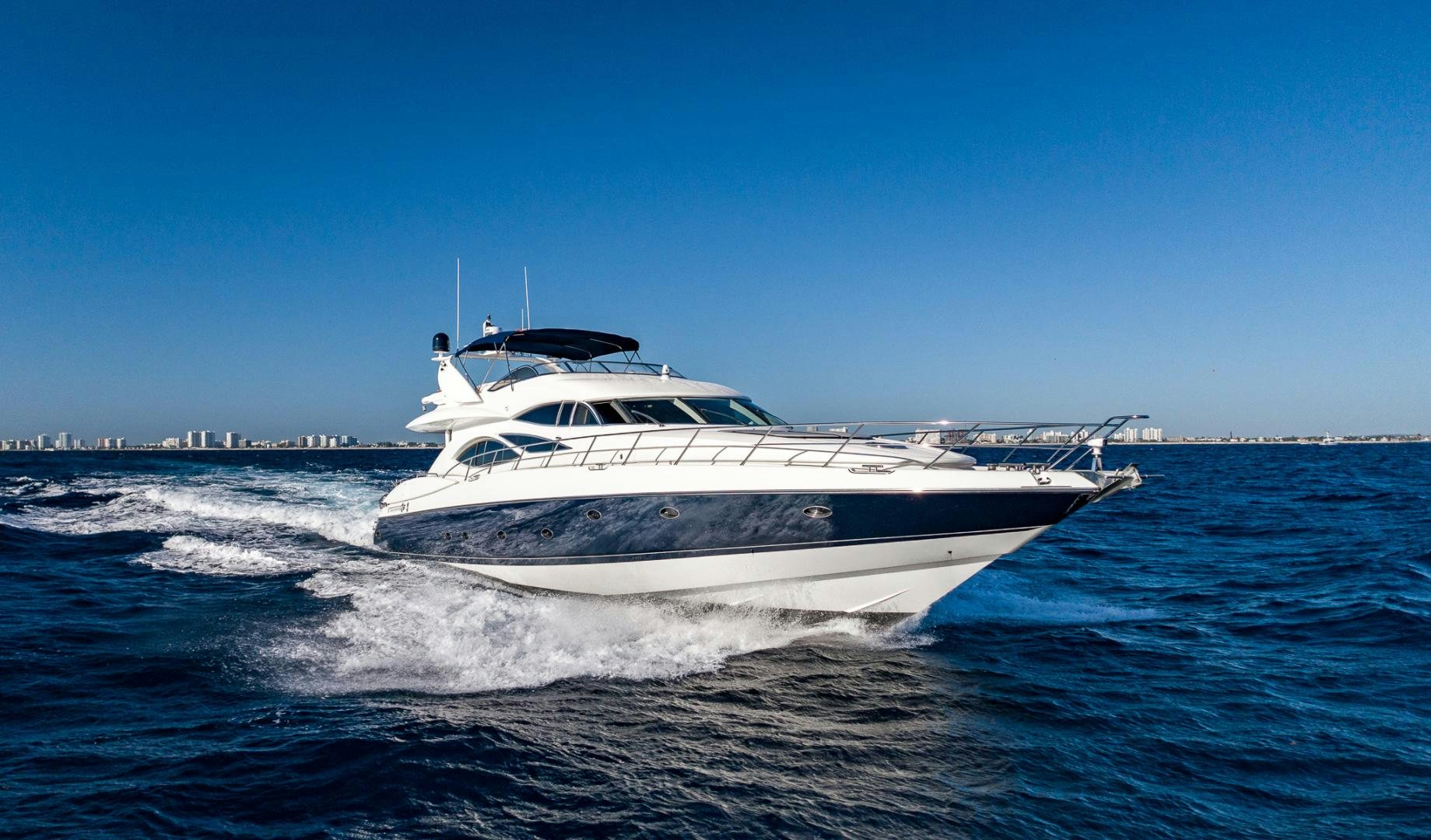 a white yacht on the water aboard SIROCCO Yacht for Sale