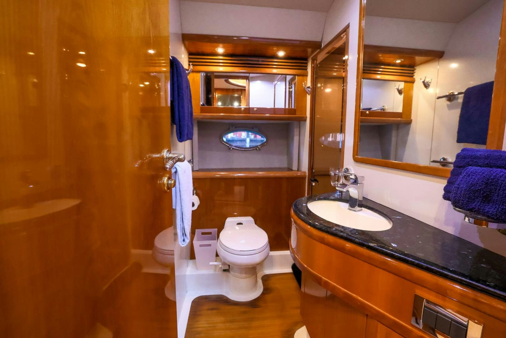 a bathroom with a large mirror aboard SIROCCO Yacht for Sale