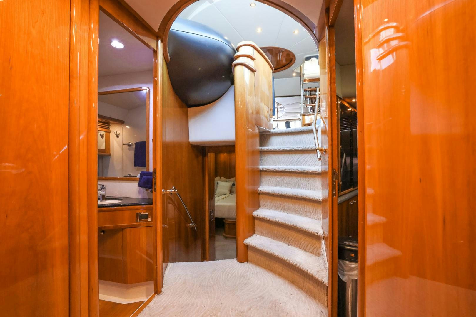a large bathroom with a large mirror aboard SIROCCO Yacht for Sale