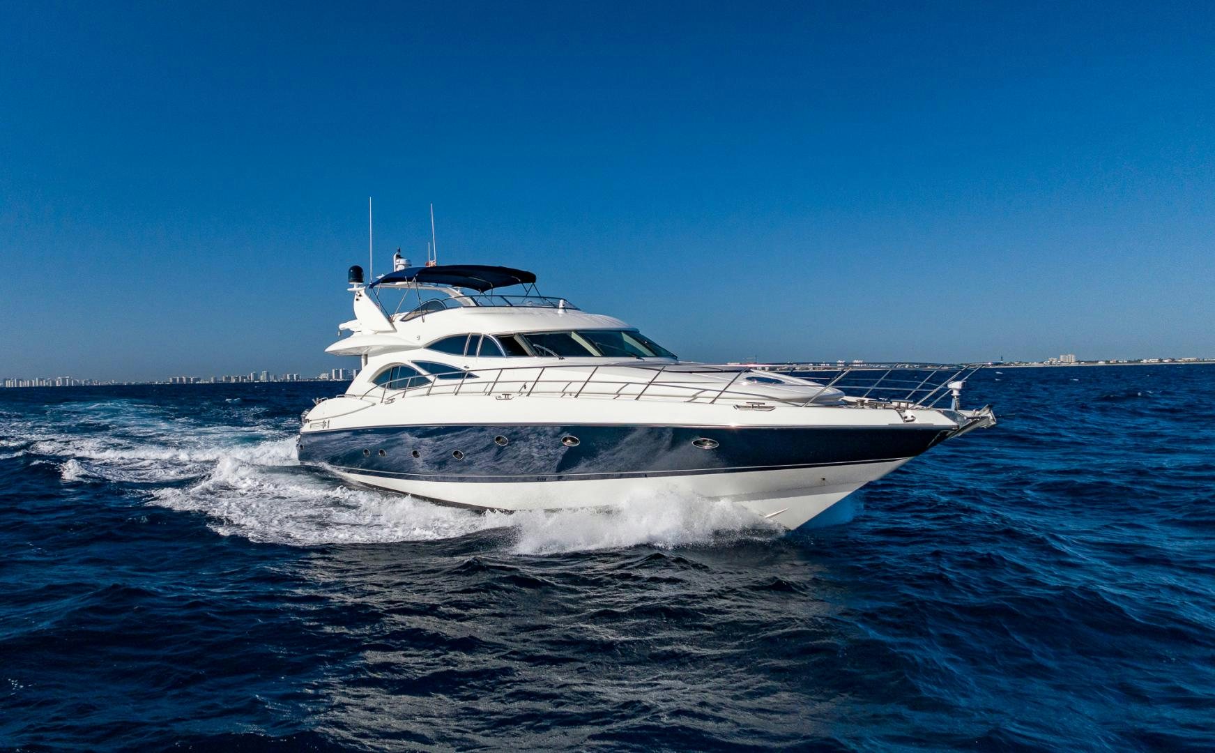 a white yacht on the water aboard SIROCCO Yacht for Sale